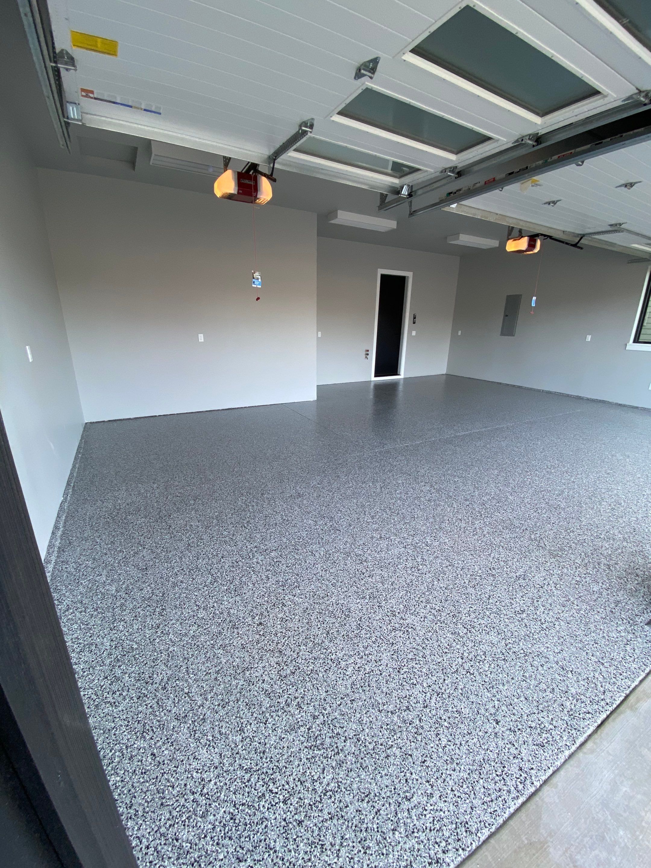 Garage Transformation using Domino by Croc Coatings, LLC