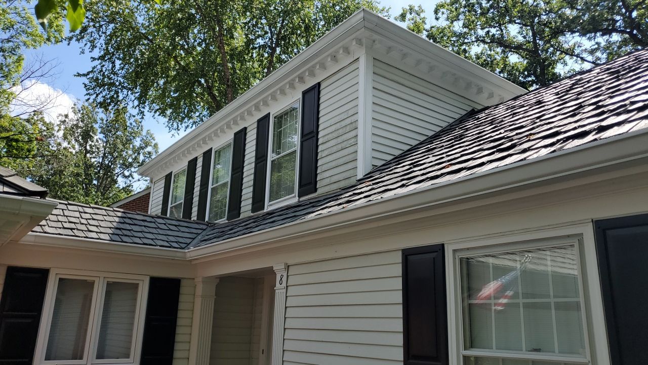 Housewashing  using Algaecide, soft wash soap by Northern Power Washing LLC.
