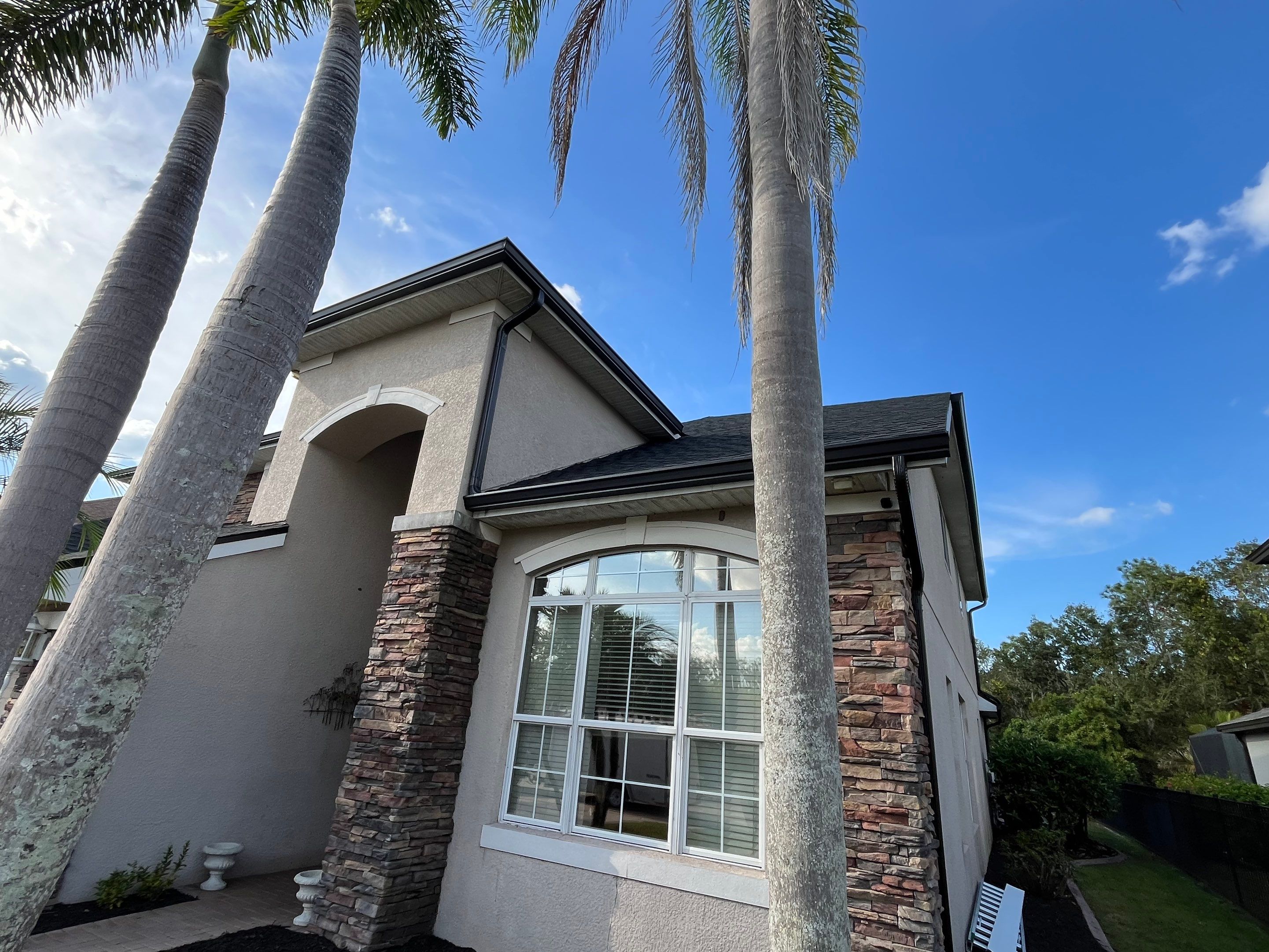 Black 6-inch Seamless Gutters for Modern Ellenton Homes FL by Gutter Professors
