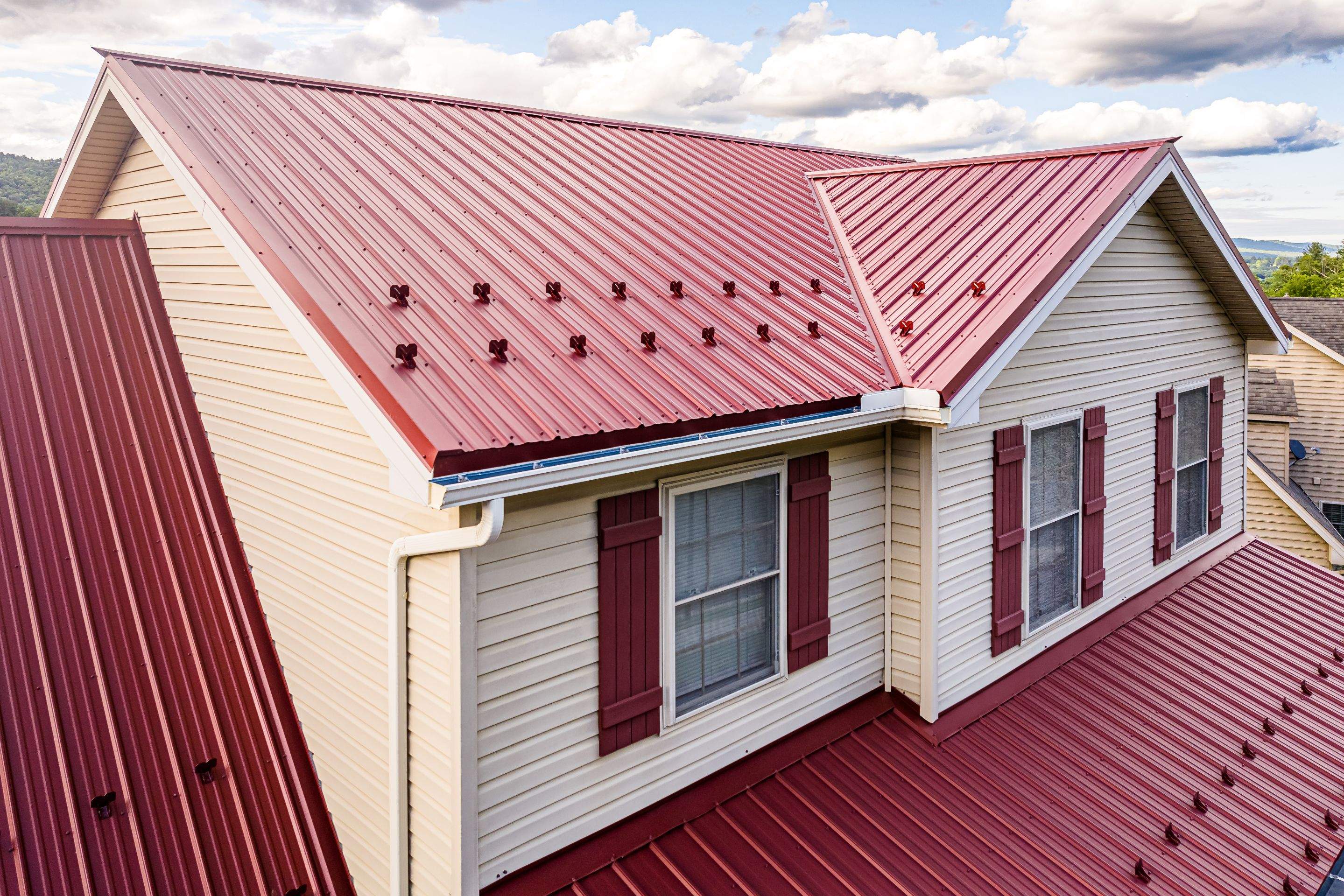 Metal roof-colonial red by Esh Builders