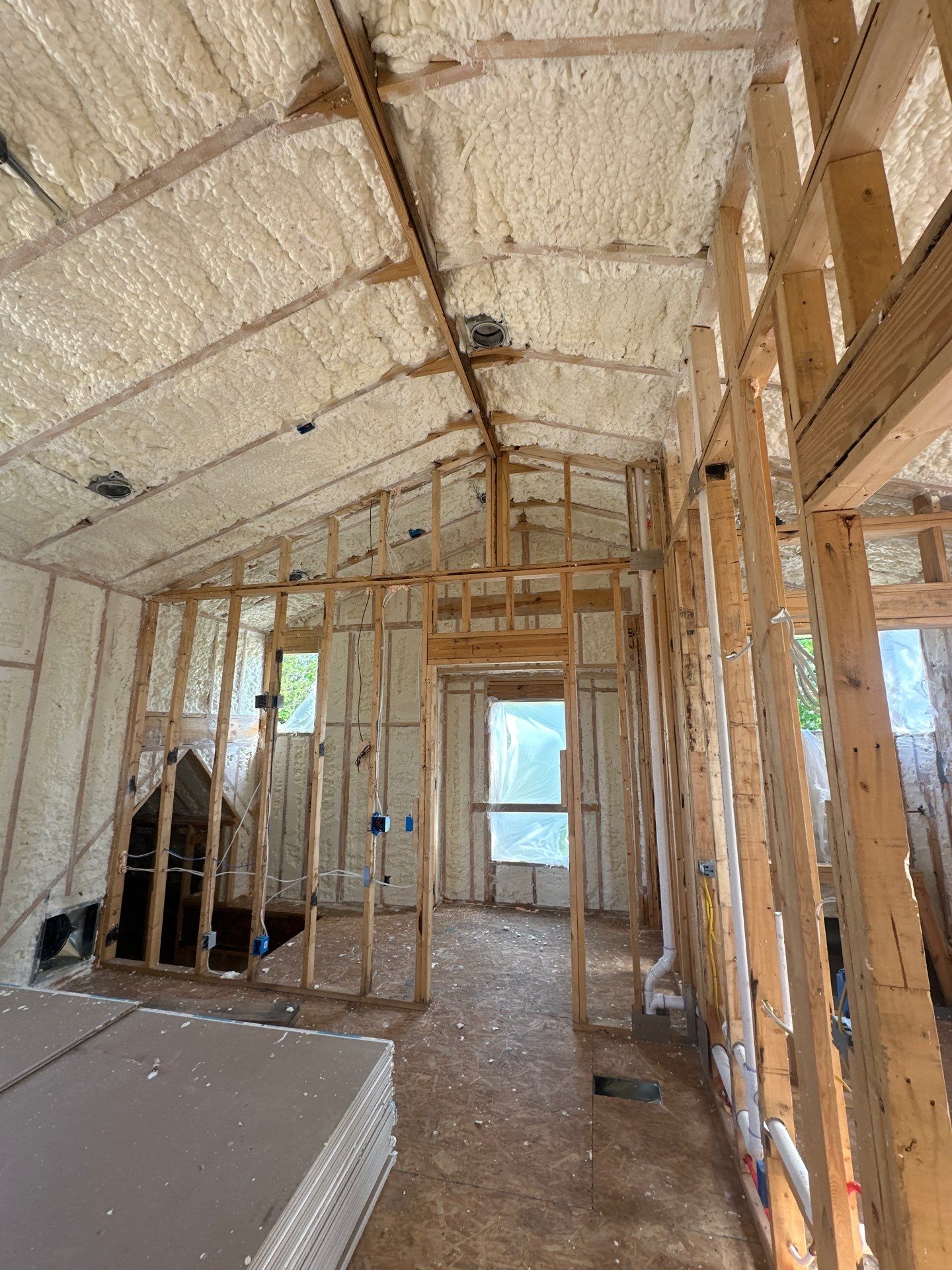 Full encapsulation with open cell spray foam on this custom home in Dallas by Apex Insulation Solutions