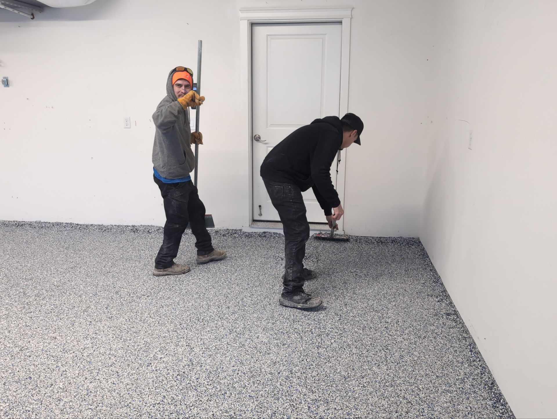 Garage Transformation using Domino with Blue by Croc Coatings, LLC