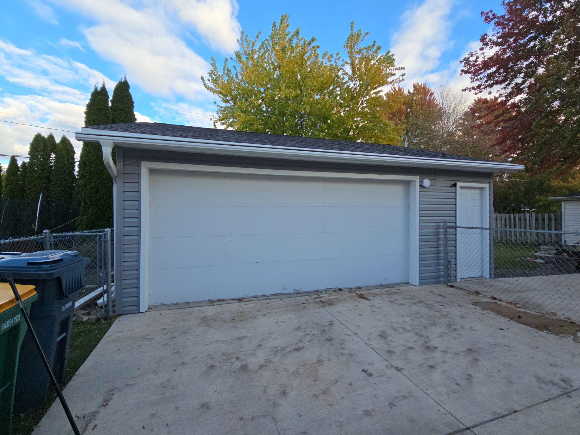 Siding Replacement with Vinyl Siding in Granite Gray by Gellings Roofing & Siding