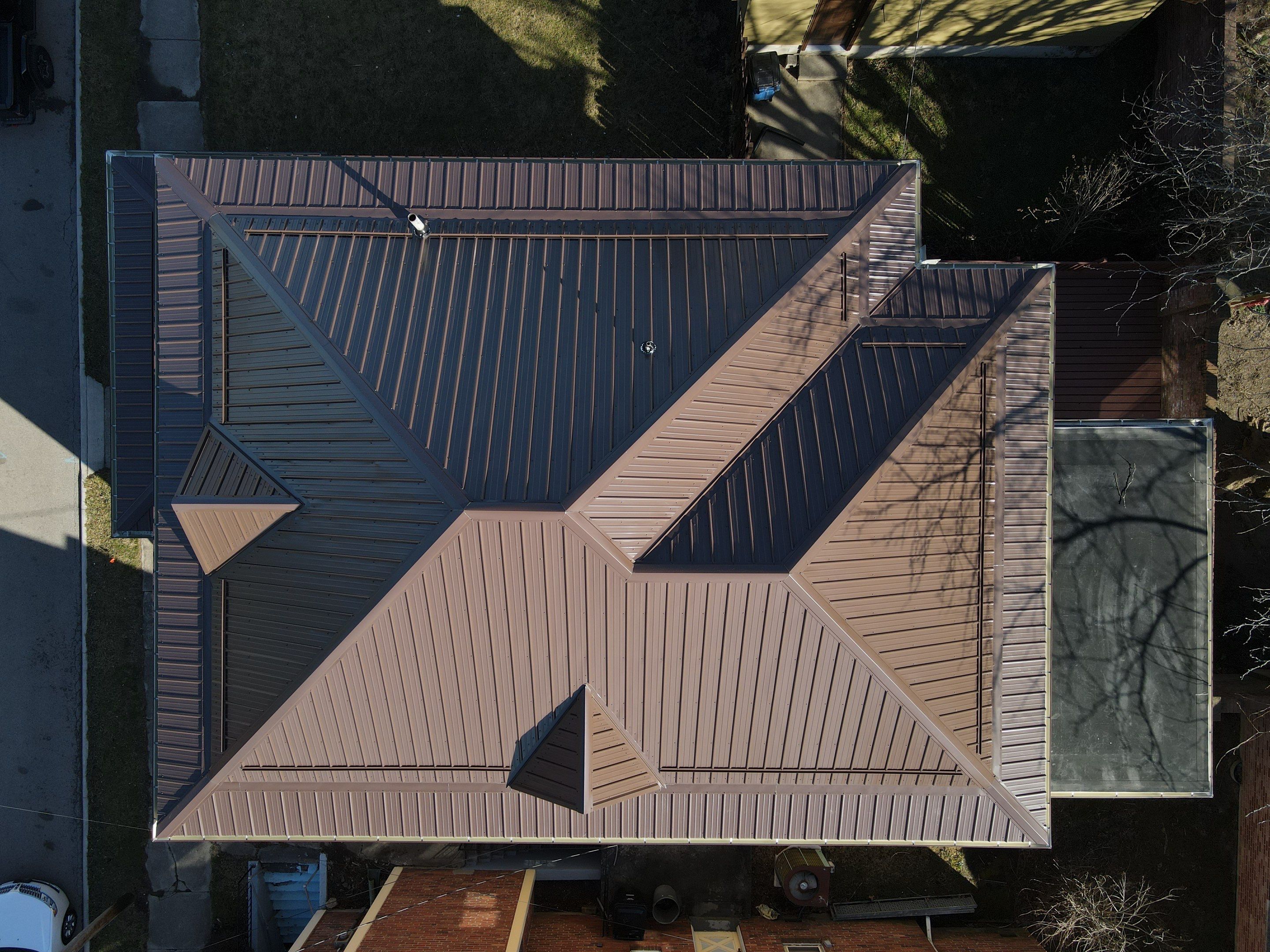 Residential Roofing Installation using Performance Panel Metal - Brown by RoofX