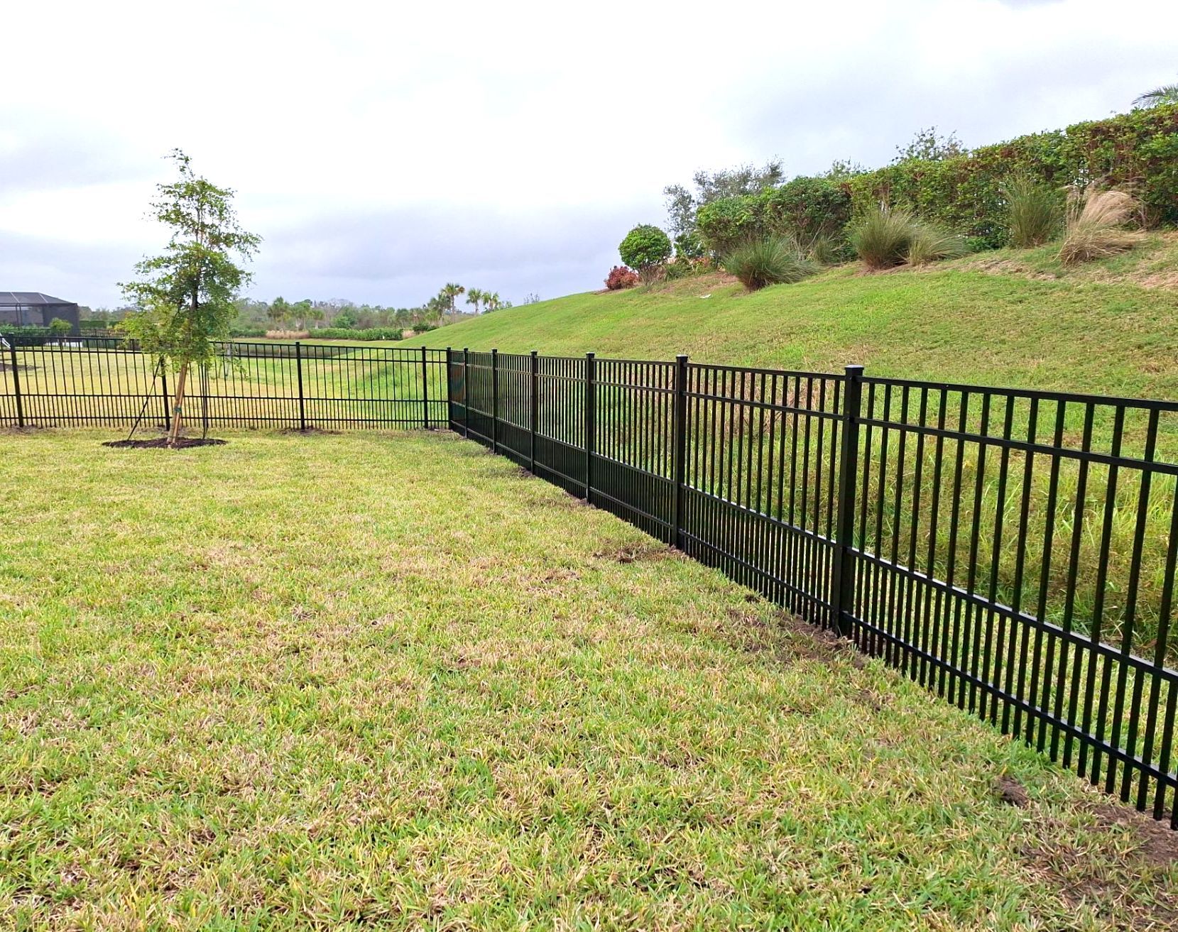 Aluminum Fence Installation using 4ft 3 Rail Black Aluminum Fence by Asap fence and gates, LLC