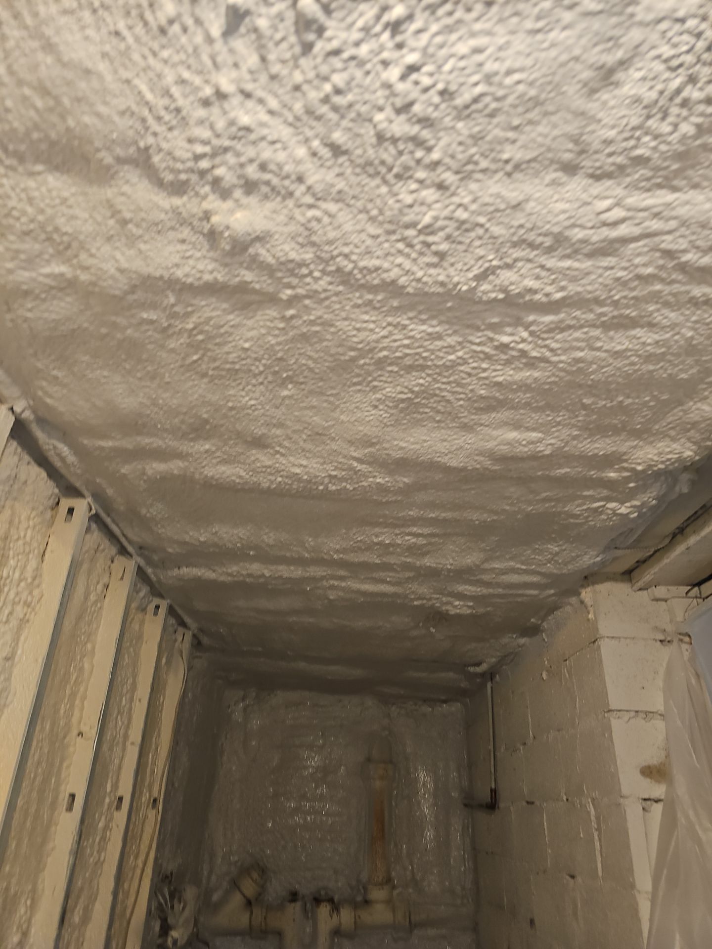 Basement Exterior Walls using Closed Cell Spray Foam by NYS Foam & Energy