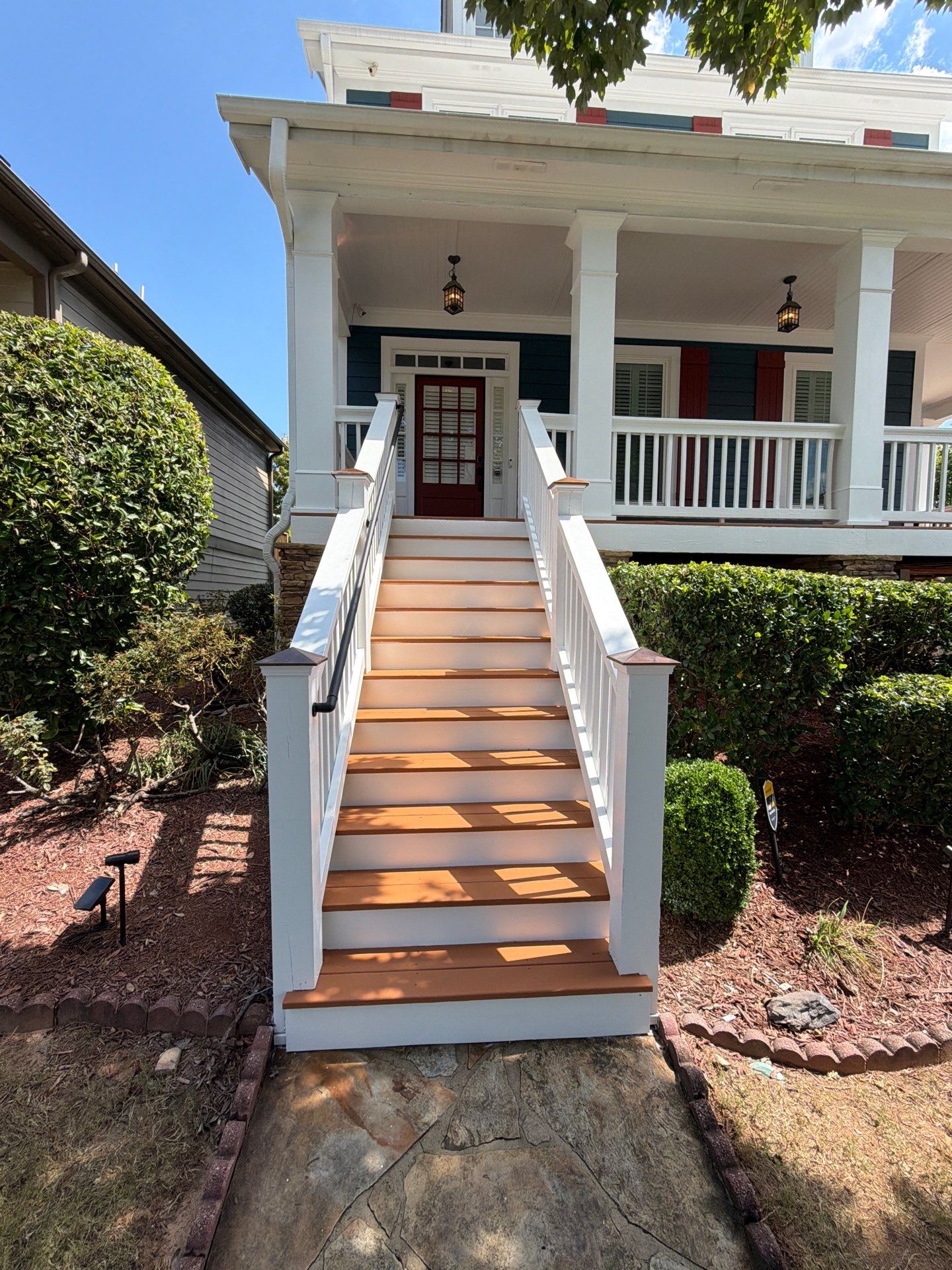 Atlanta Exterior Home Refresh with Blue Siding and Deck Staining by Swift Home Renovations 