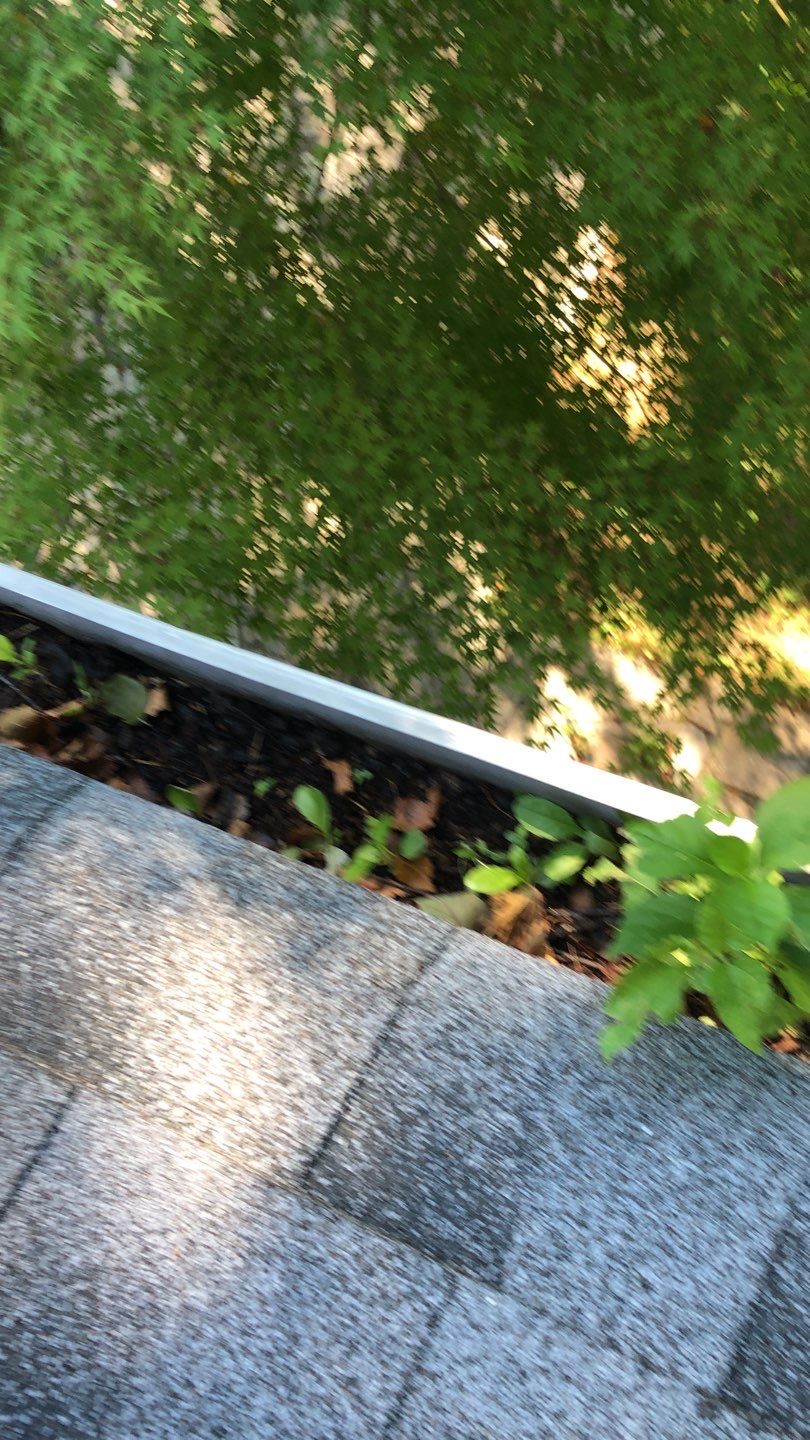 Gutter Cleaning by American Home Contractors