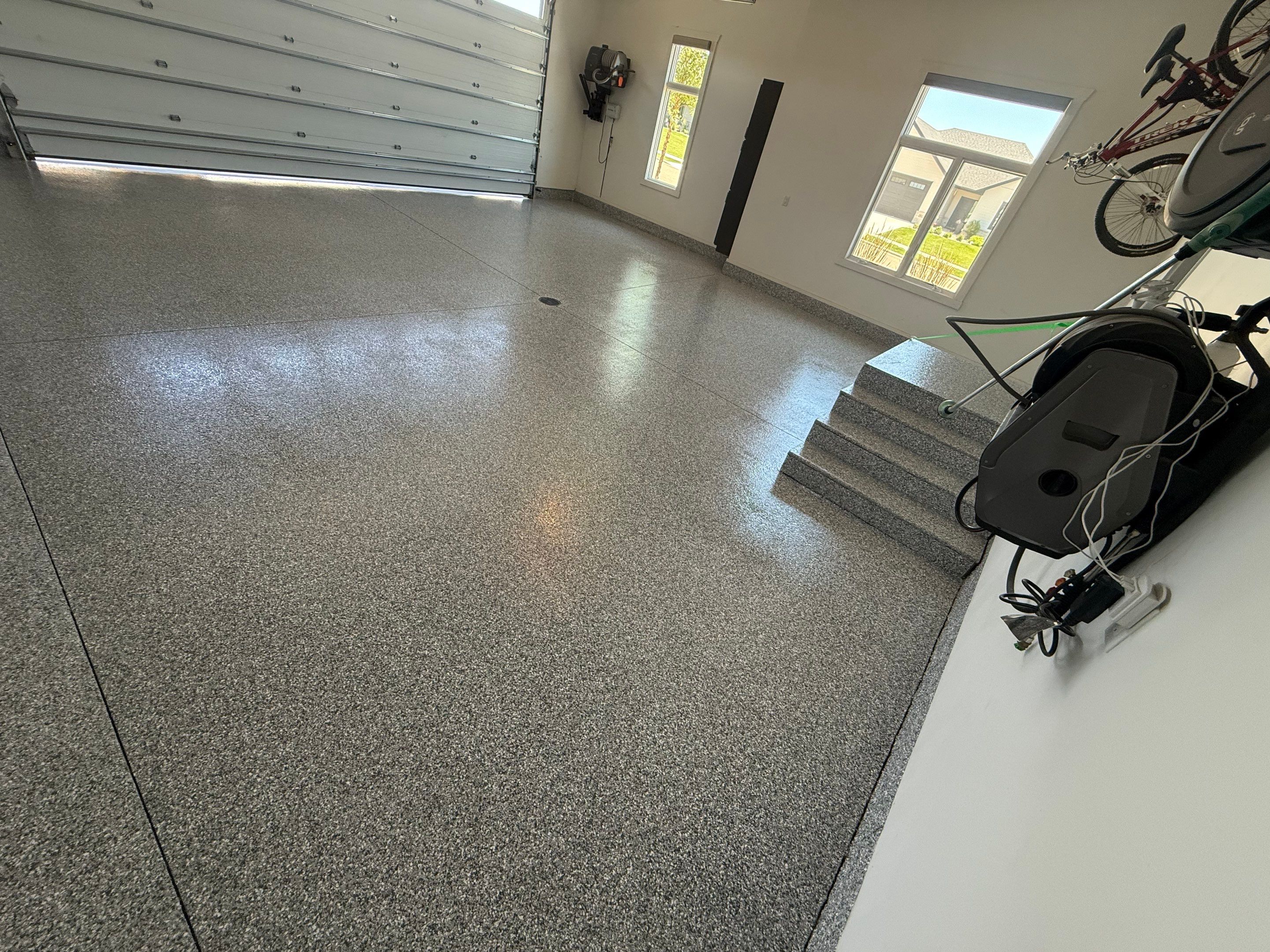 Gravel Flake Garage Floor Coating in Yankton by Select Painting, Coatings & Garage Cabinets