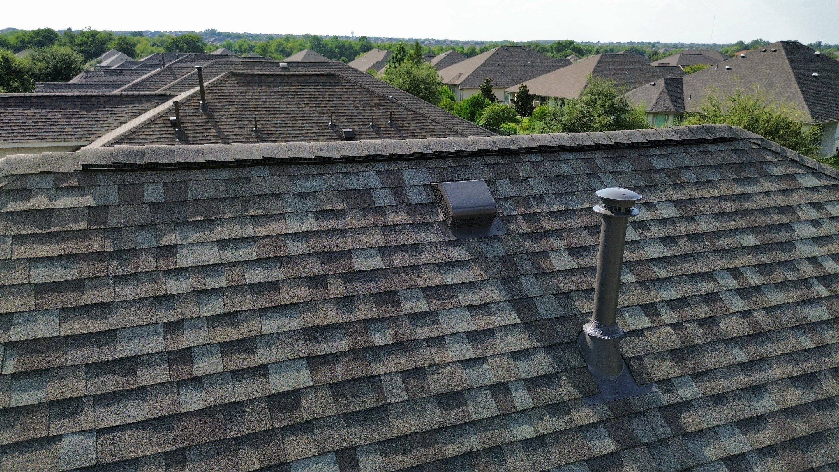 Full Roof Replacement with Solar Reinstall – Duration Driftwood | Round Rock, TX by Kstylez Roofing & Construction