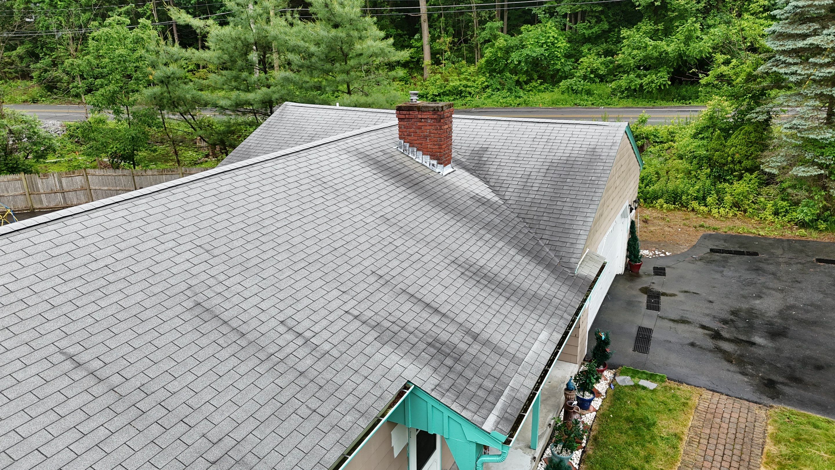 Roof Replacement with Gutter Guards – Westford, MA by Mighty Dog Roofing of Greater Middlesex County