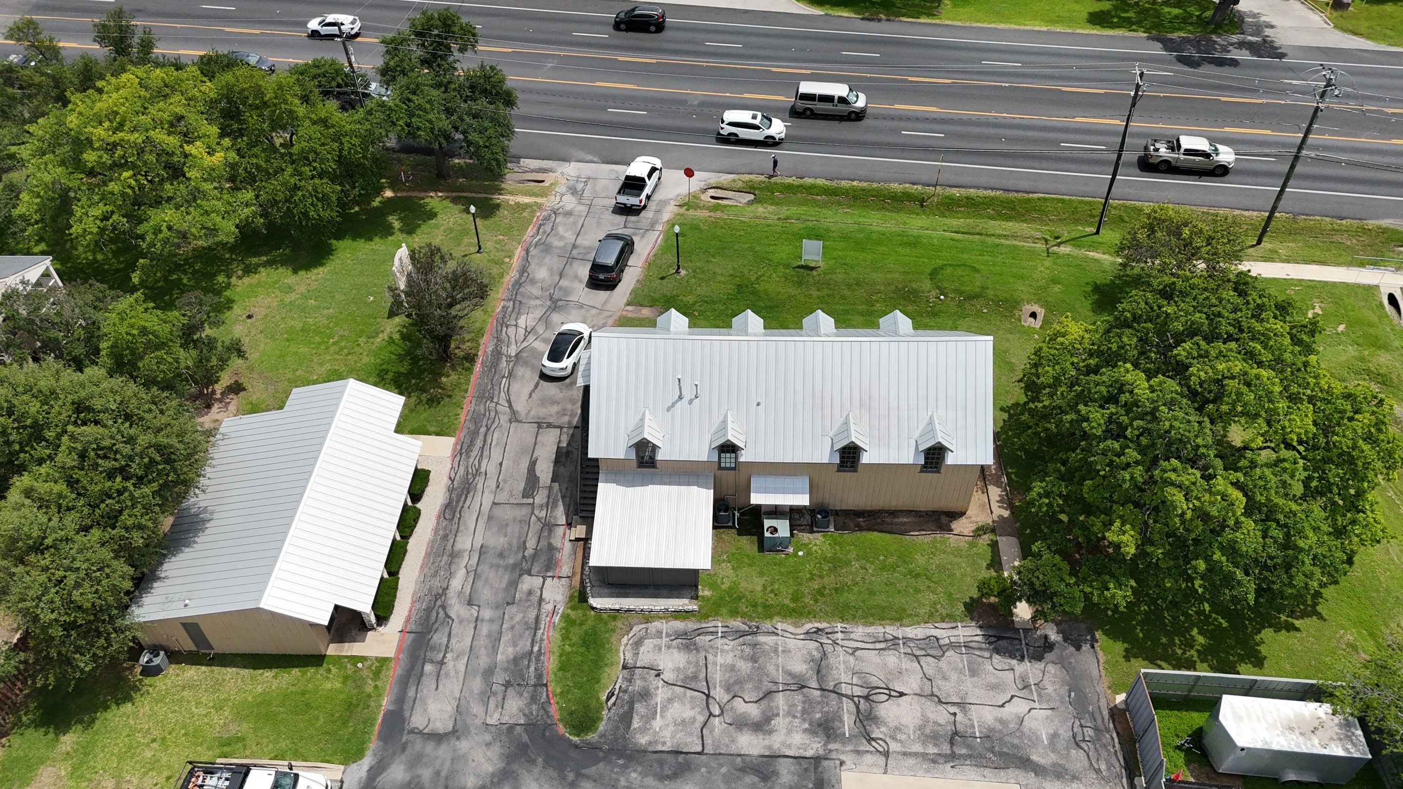 Commercial Roofing Installation using 24 GA Double-Lock - Galvalume by Action Exteriors Austin