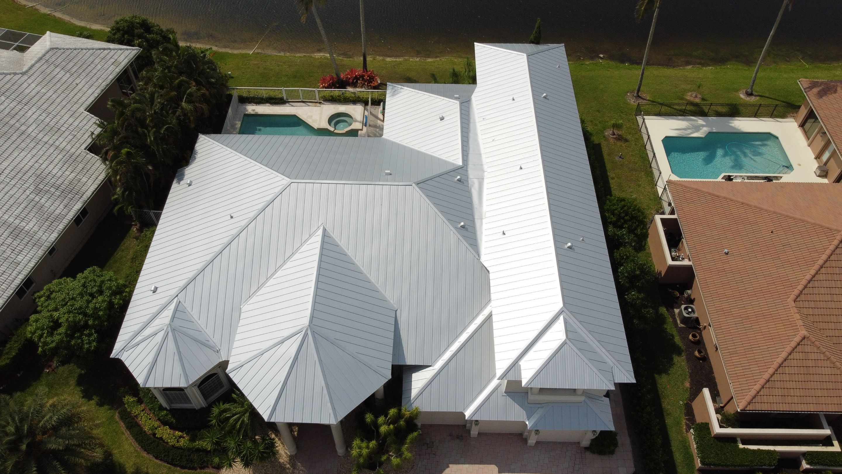 Residential Roofing Installation using 1" Nail strip metal roof by BLUES BROTHERS ROOFING