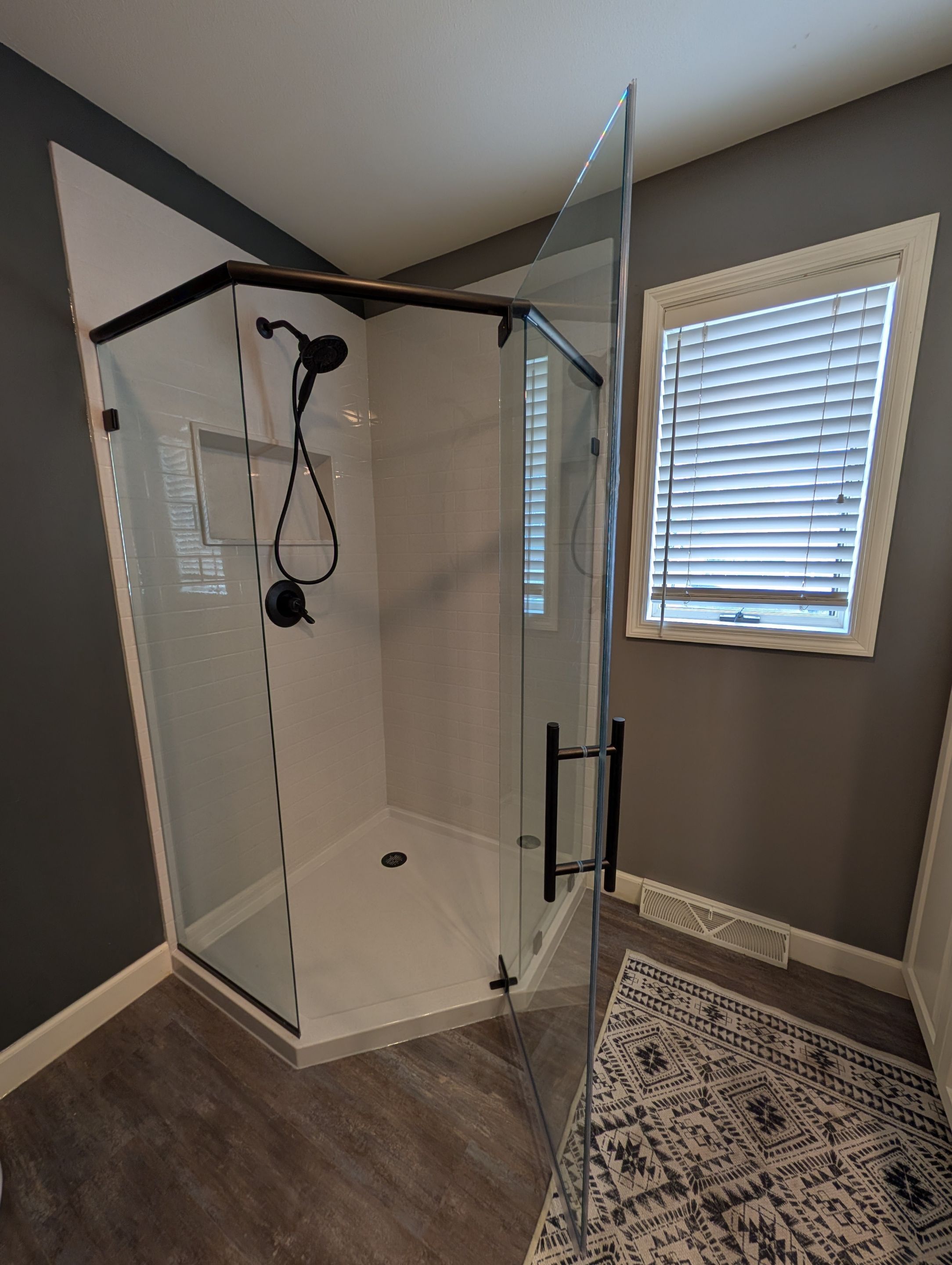Two Shower replacements by Homebound Construction