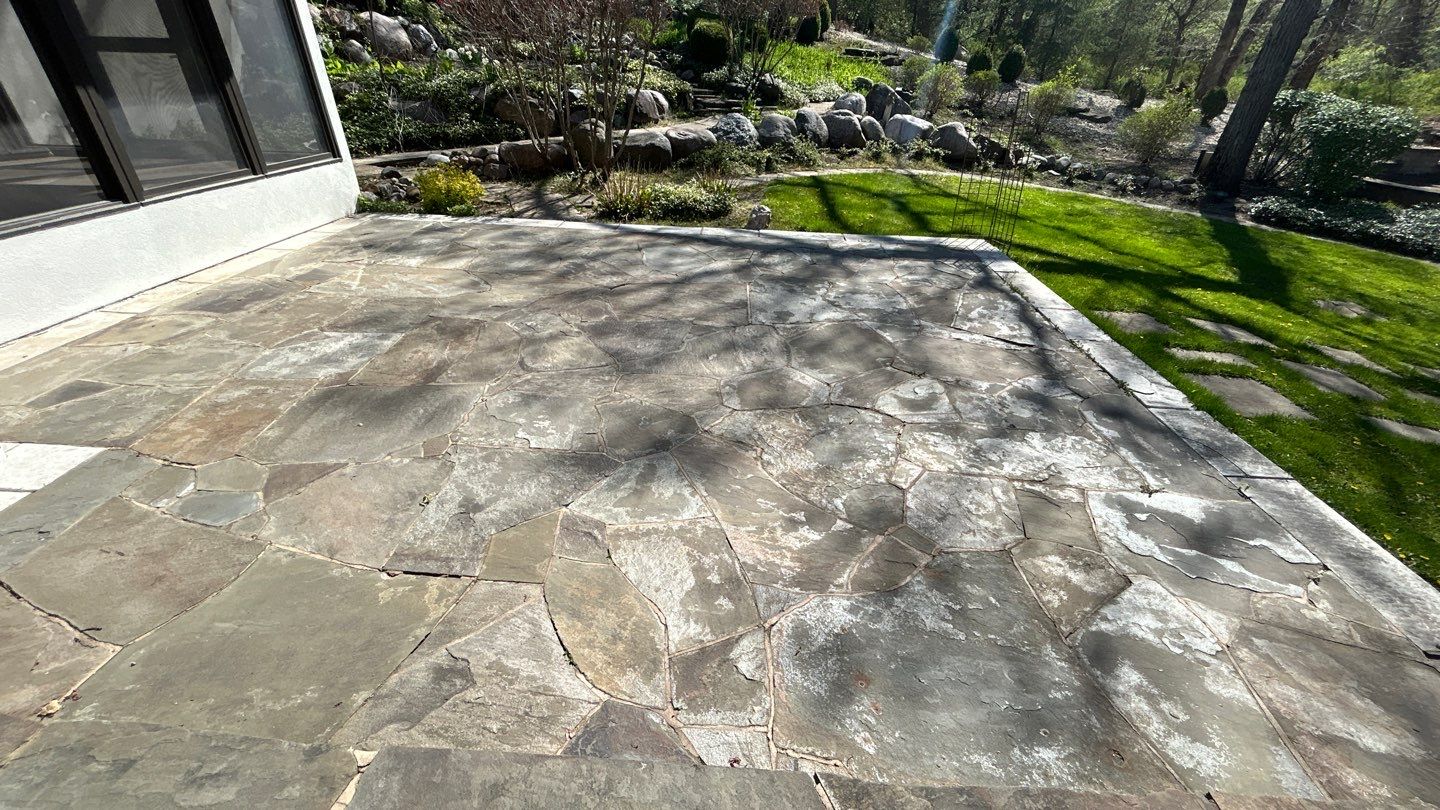 natural stone using Algaecide, soft wash soap by Northern Power Washing LLC.
