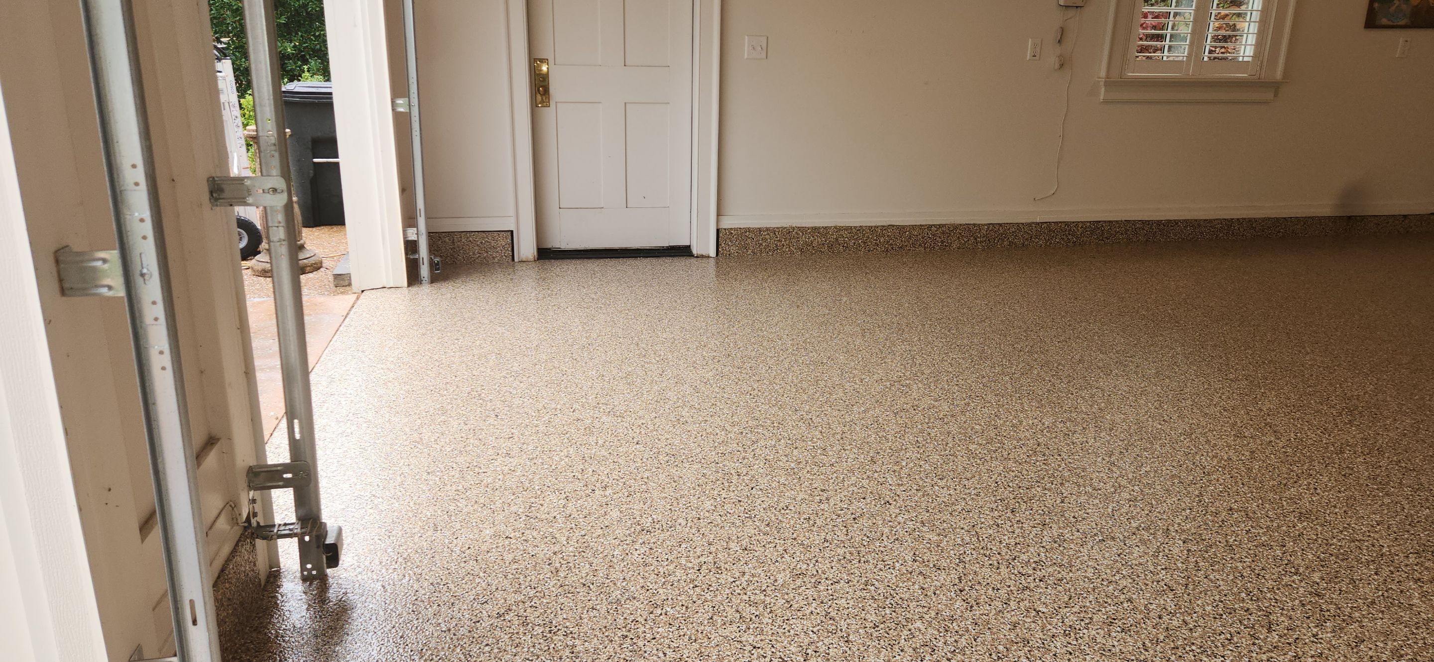 Garage using Saddletan by Elite Floor Solutions
