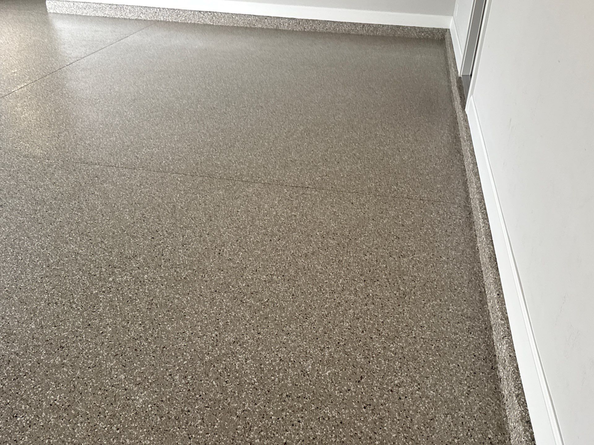 Garage In Pebble Beach  by Cross Creek Concrete Coatings