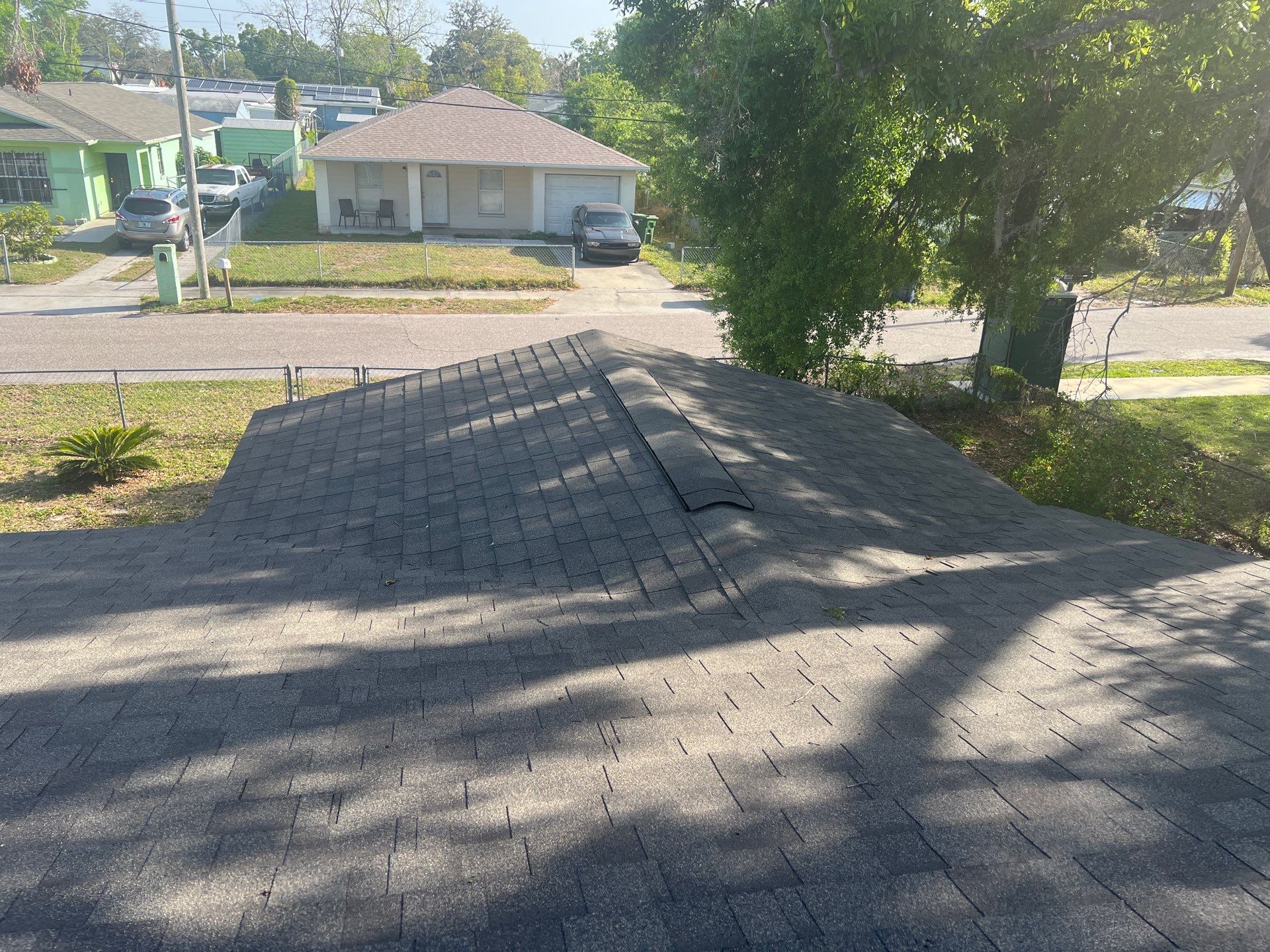 Estate Gray Shingles by Reimagine Roofing