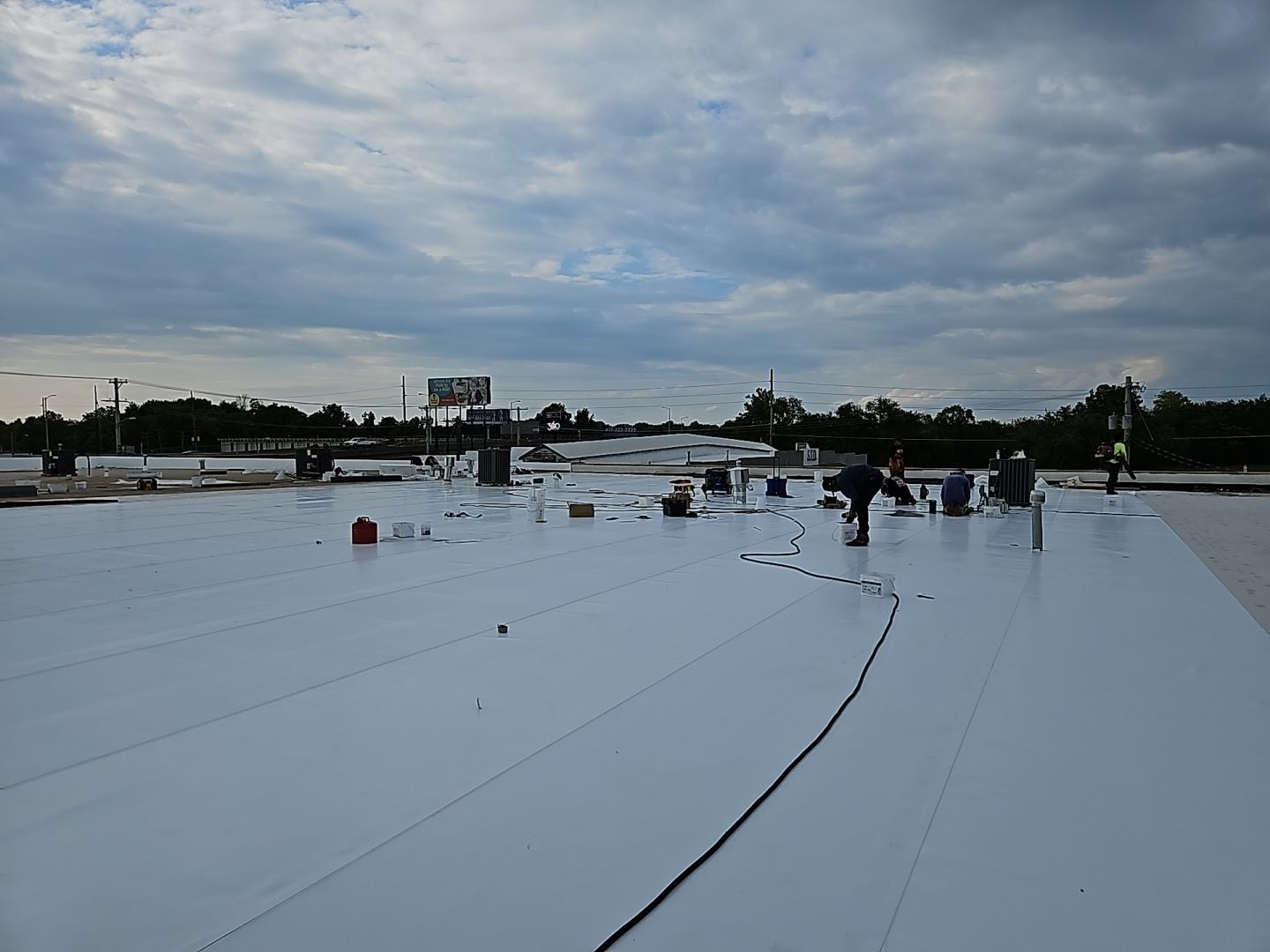 Commercial Flat Roofing Install  by Titan Commercial & Residential Roofing 