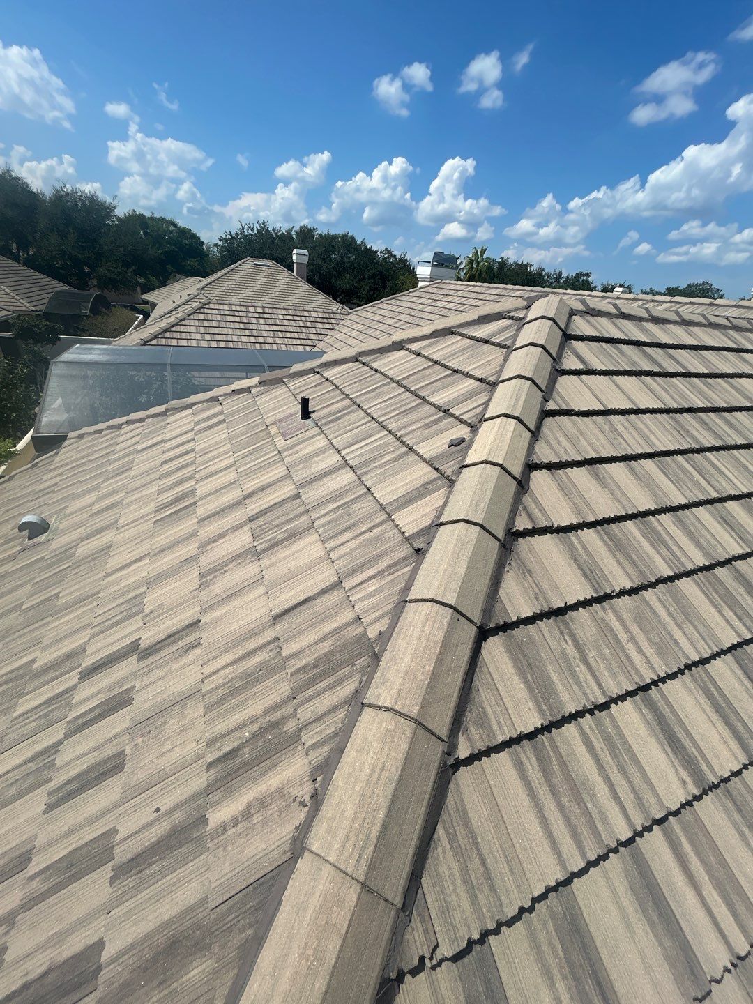 Concrete Tile Roof Repair and Gutter Maintenance in Orlando by Fortified Roofing Solutions Corp.