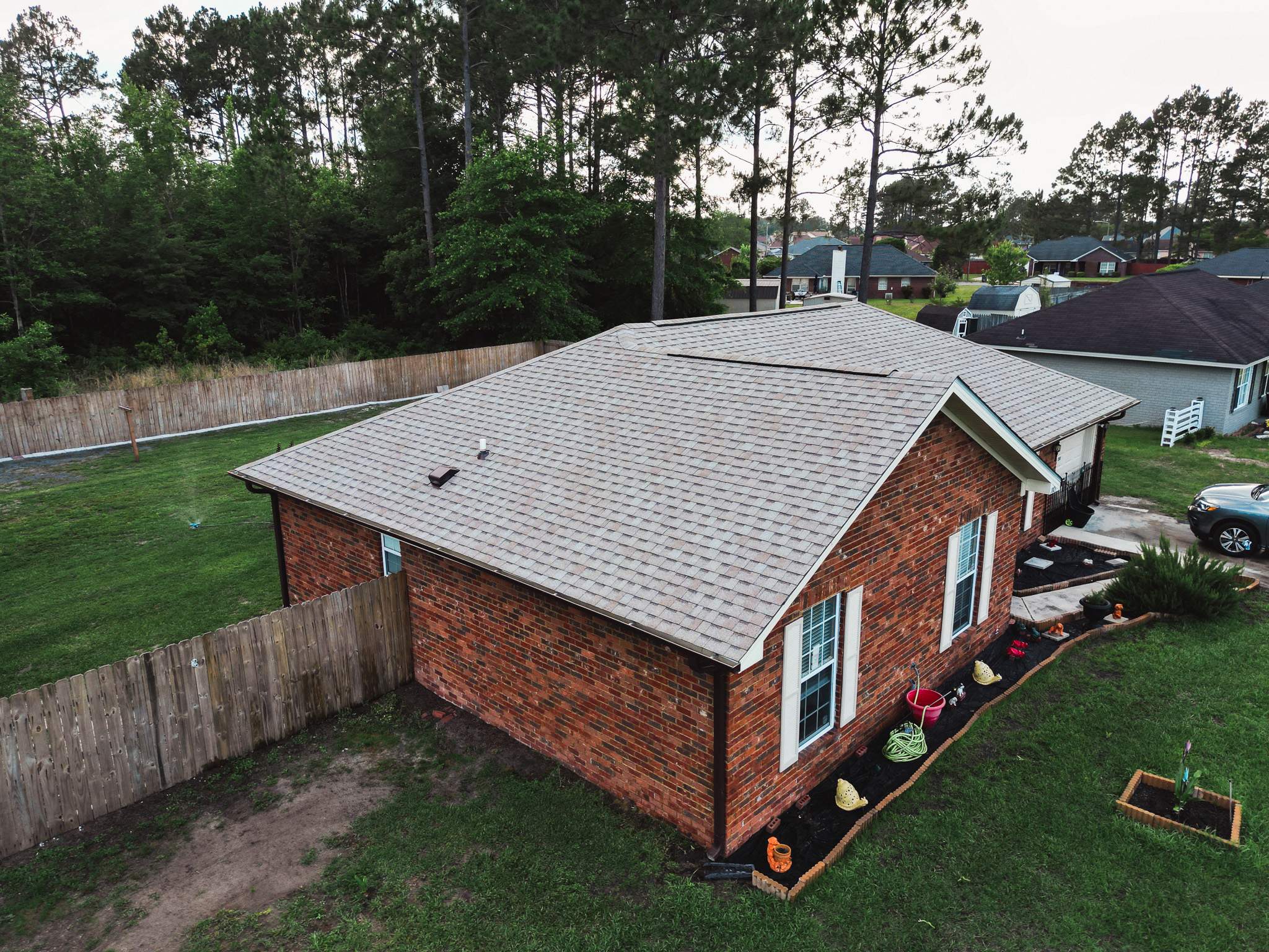 Residential Roofing Installation using Atlas Pinnacle Pristine Tan Mist by Talya Roofing
