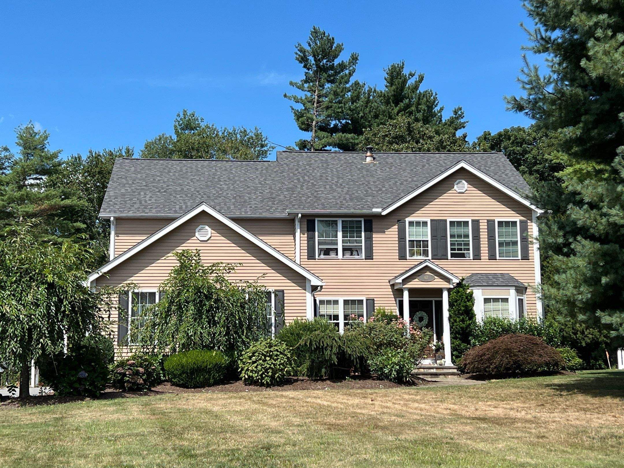 Pewterwood Roofs by Pinnacle Roofing & Skylights