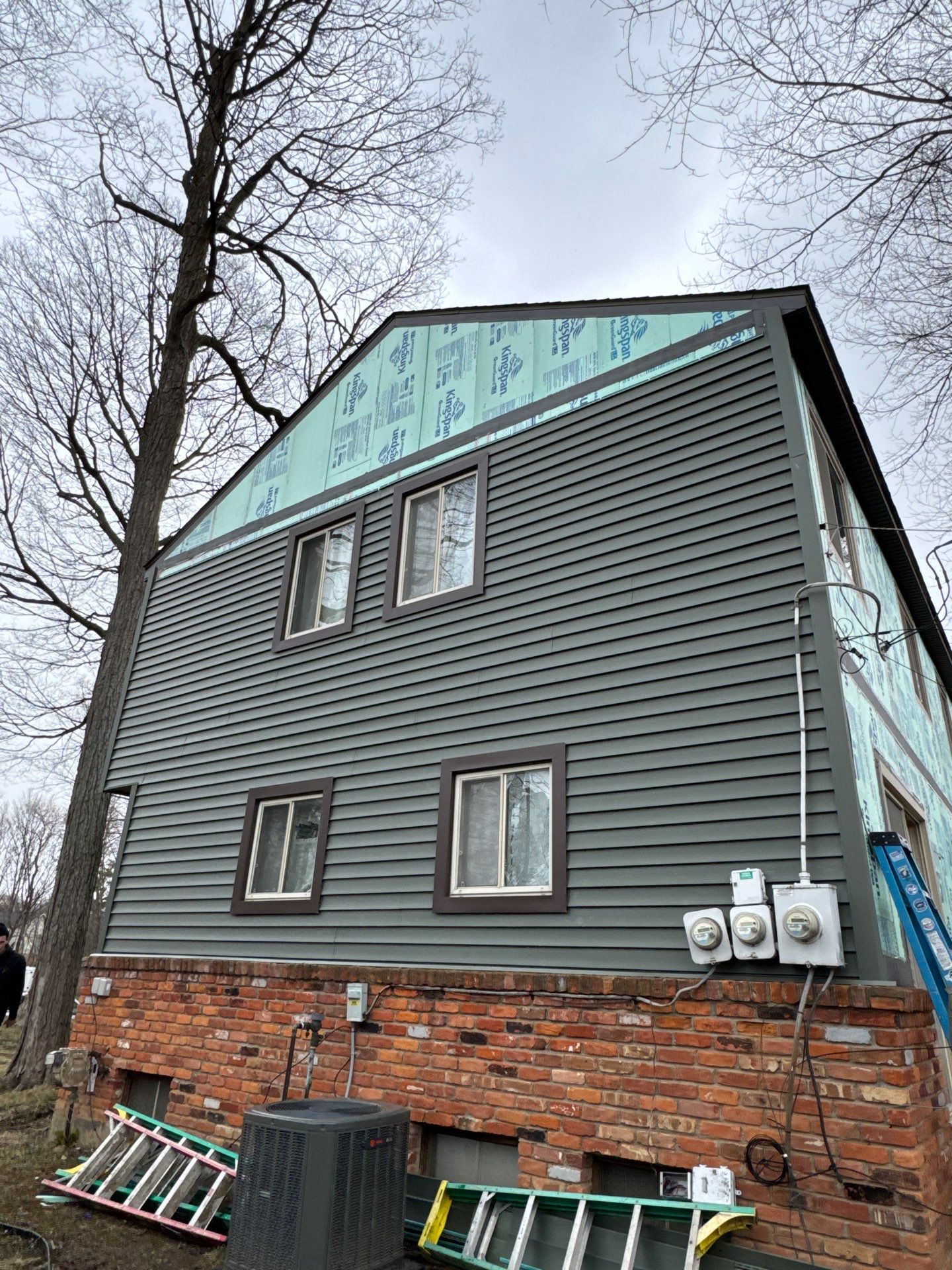 Siding Replacement using Alside Charter Oak D4.5" Deep Moss by 180 Contractors