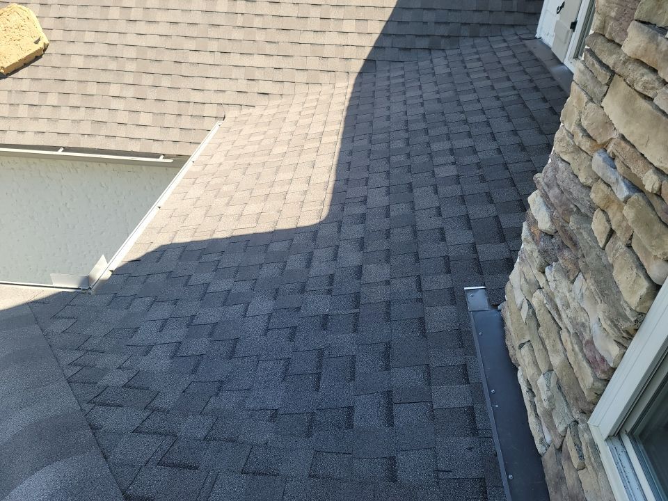 Residential Roofing Installation using Roof Replacement by American Roofing & Construction LLC