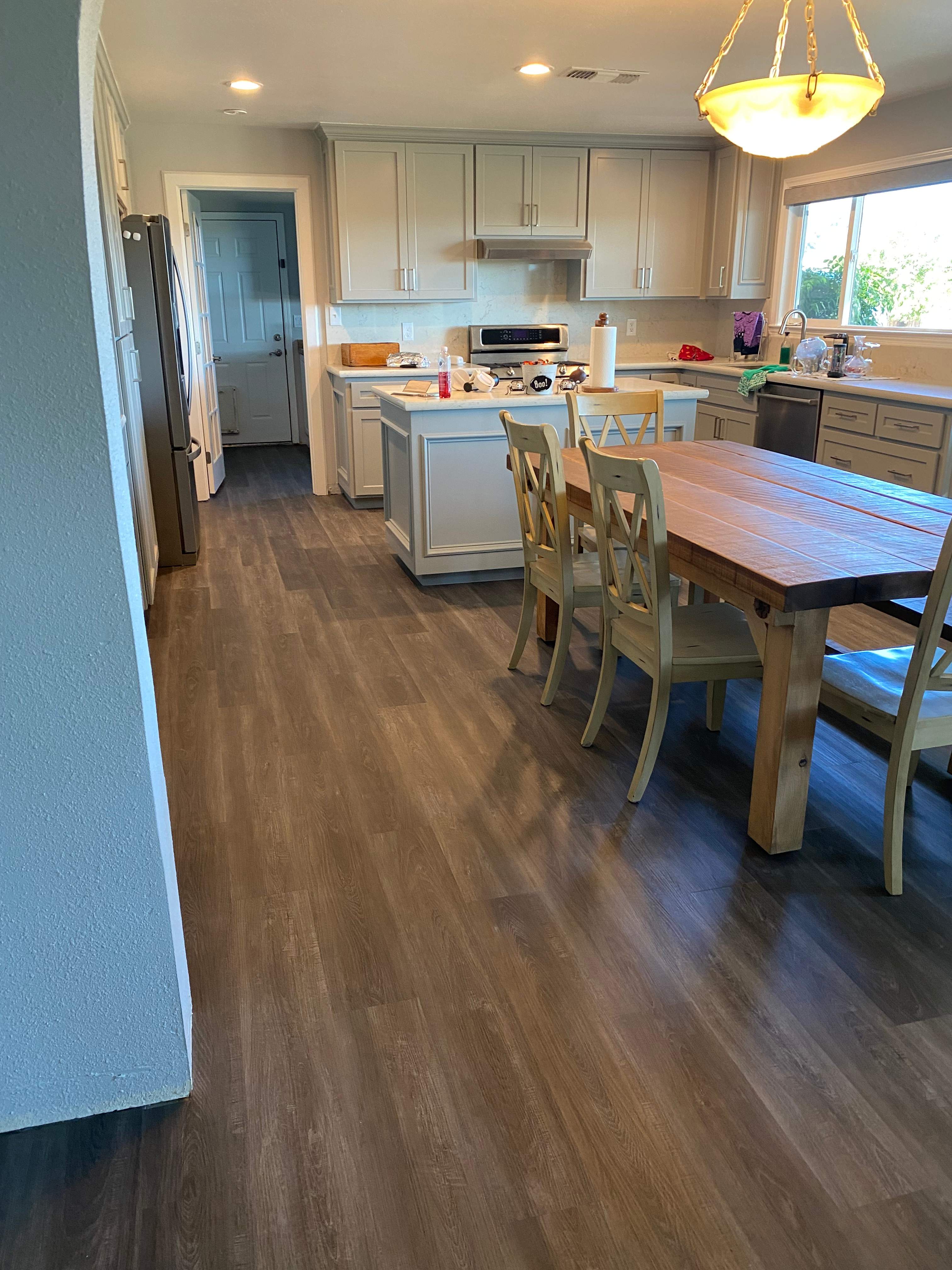 LVP Flooring for newly remodeled kitchen in Newcastle. by Footprints Floors South Sacramento
