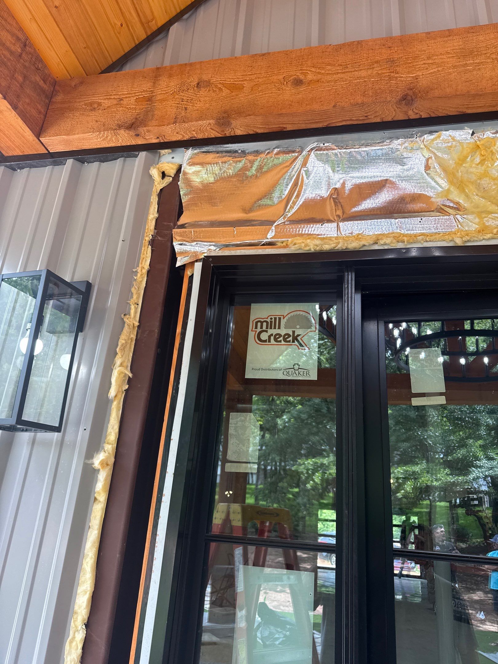 Front Porch Metal Canopy & Cedar Stain in Edmond, OK by 5Coat Roofing & Construction