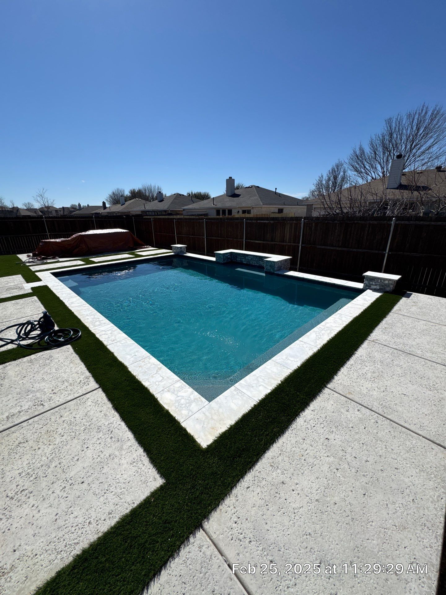 Geometric Pool with Raised Water Feature Wall and Turf by Pinnacle Pools and Spas - DFW