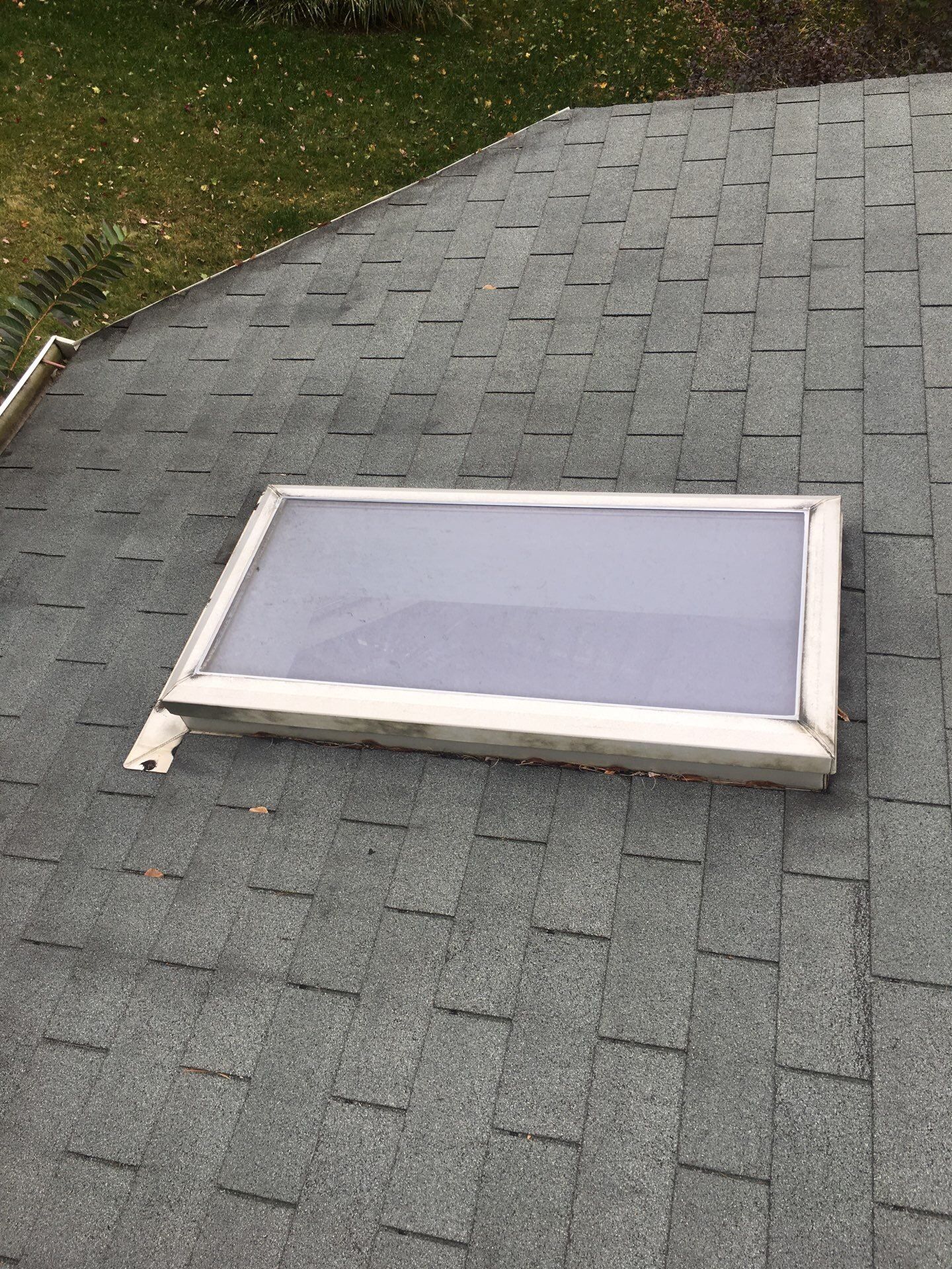 Roof and Skylight Replacement by American Home Contractors