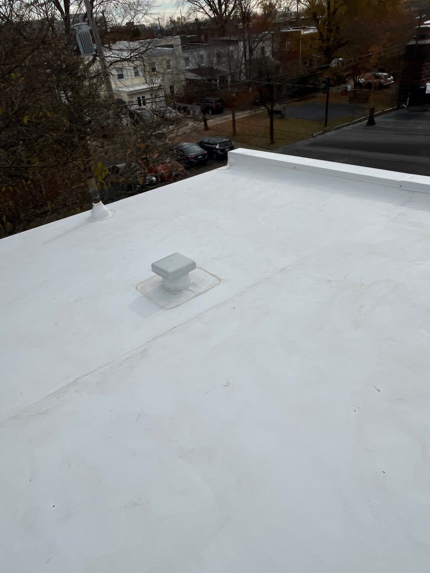 Alexandria: Residential Flat Roof Replacement with Mule Hide TPO Membrane by RM Banning, Inc.