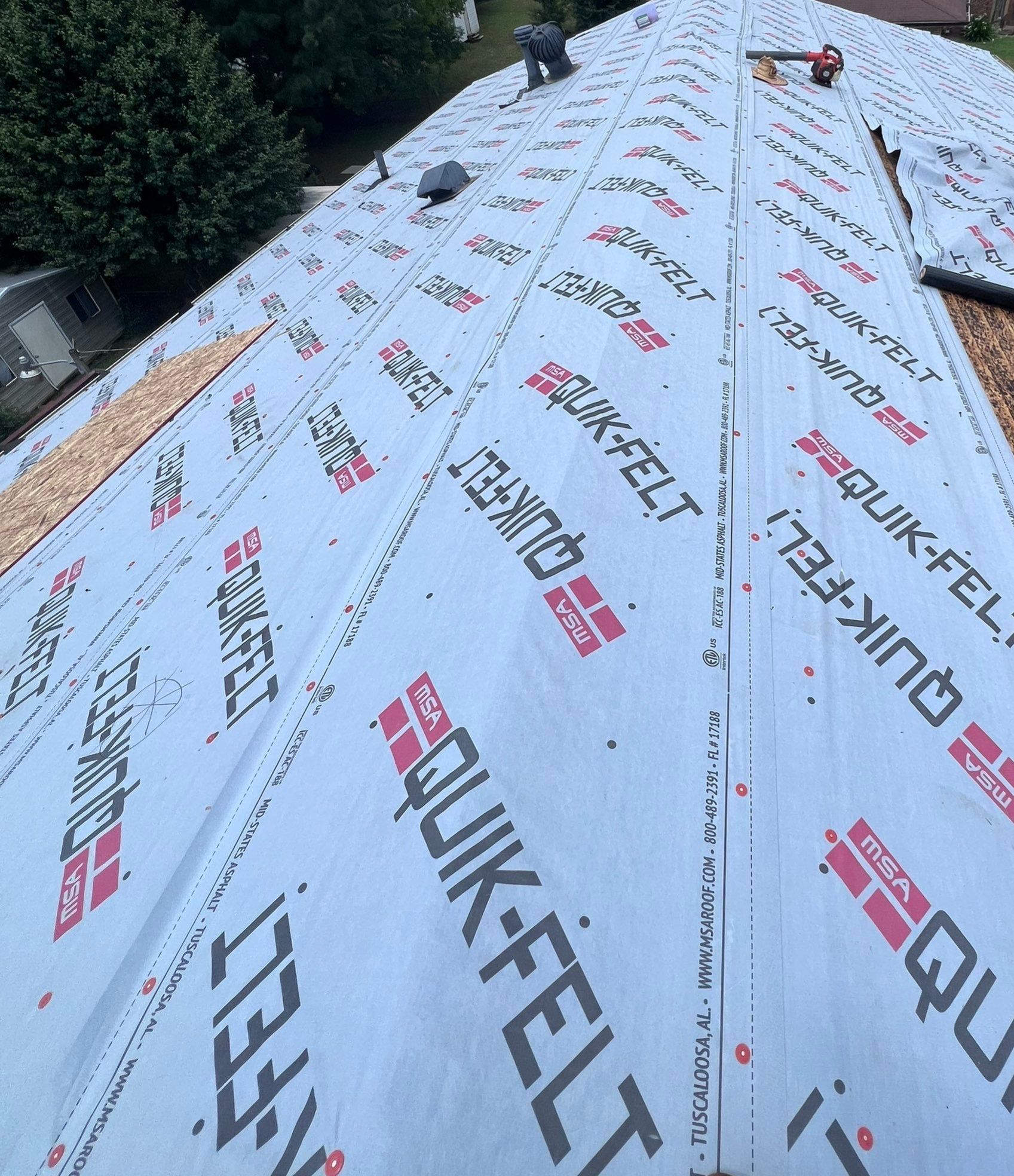 Residential Roofing Installation using Architectural Shingles by The Roofing Dudes