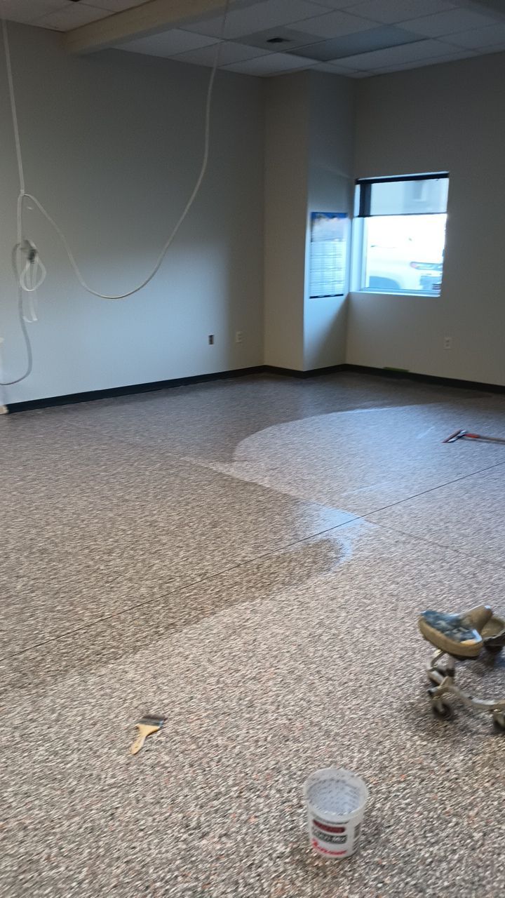 Equipment Share Commercial Floor Transformation using Smoke w/ 5% Orange by Croc Coatings, LLC