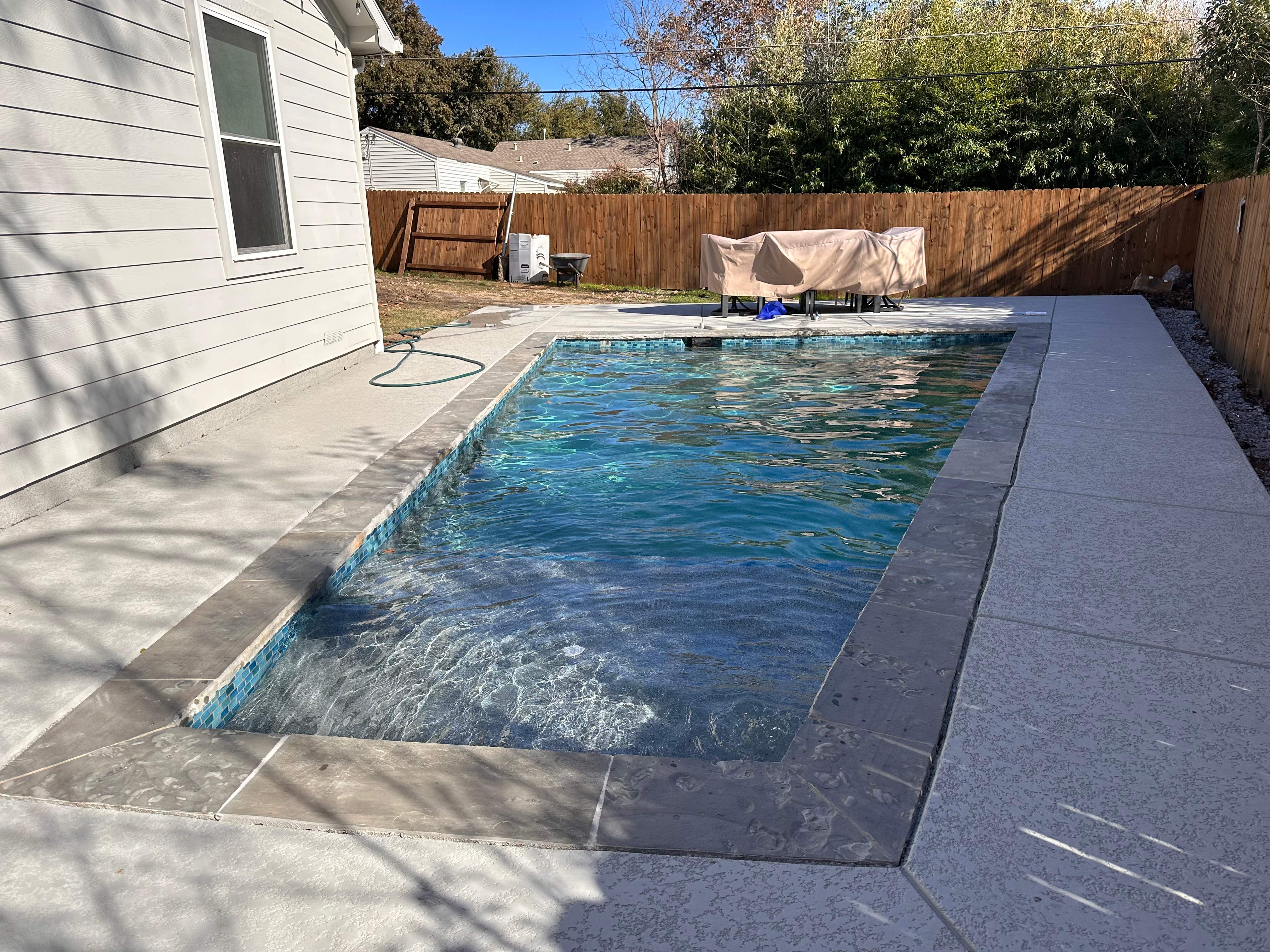 Geometric Pool with Stone Coping by Pinnacle Pools and Spas - DFW