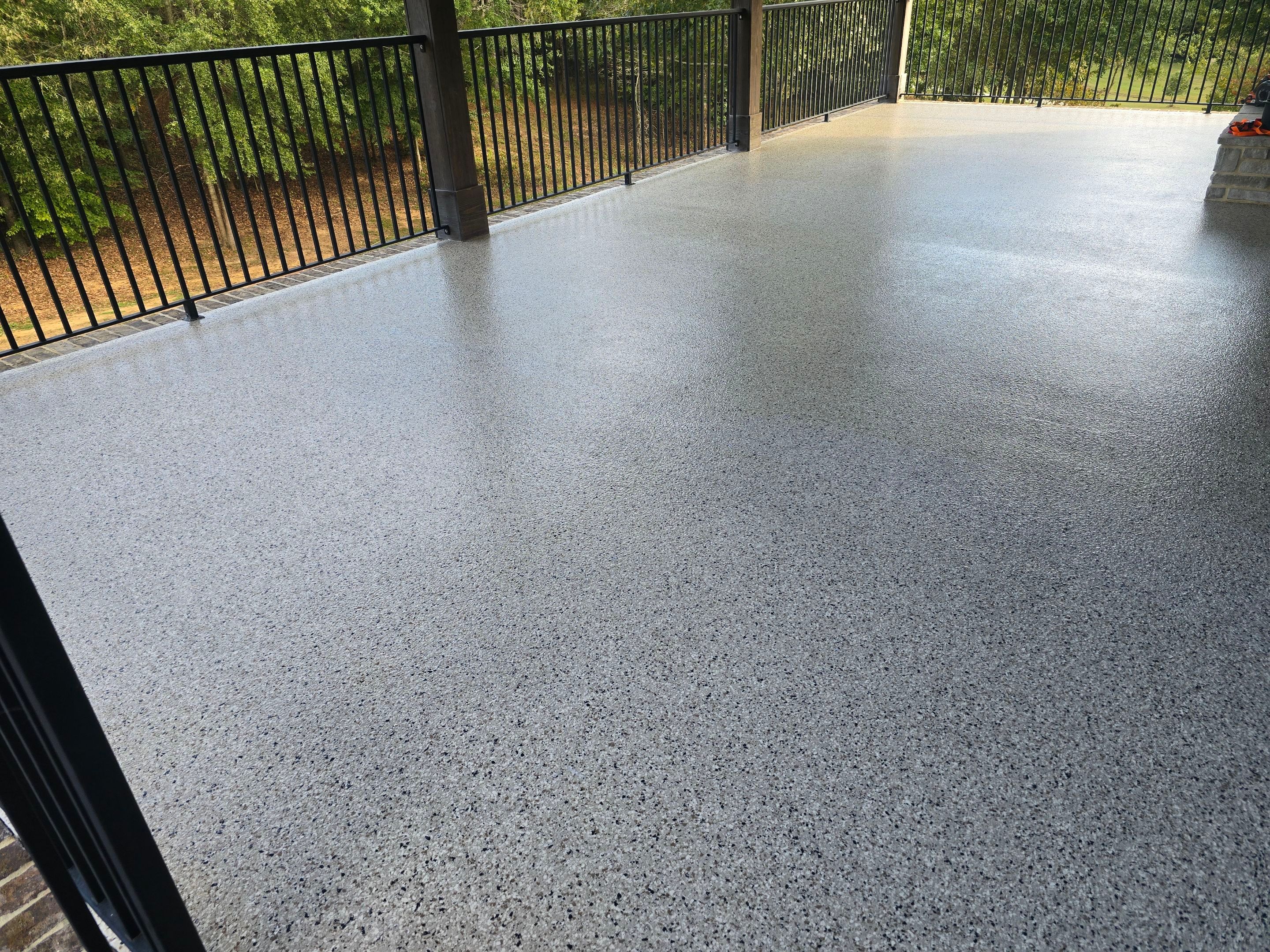 Garage & Porch Using Creekbed & Shoreline by Elite Floor Solutions