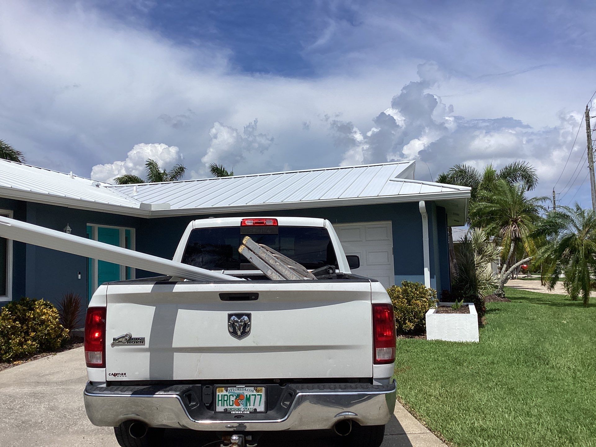 White Downspouts and Gutters Combo in Punta Gorda FL by Gutter Professors