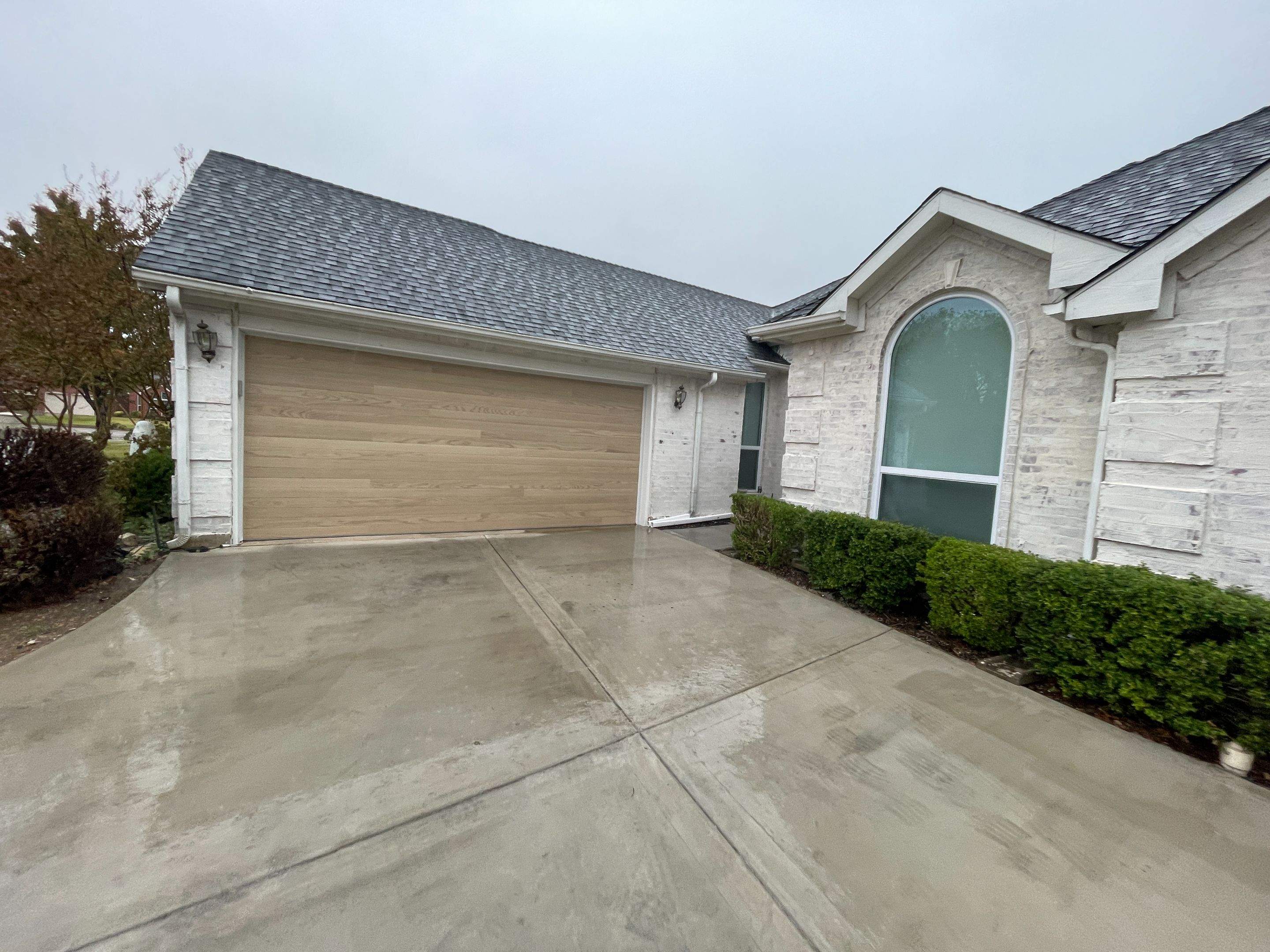 CHI Planks Natural Oak Garage Door Installation in Trophy Club by Meadows Garage Doors