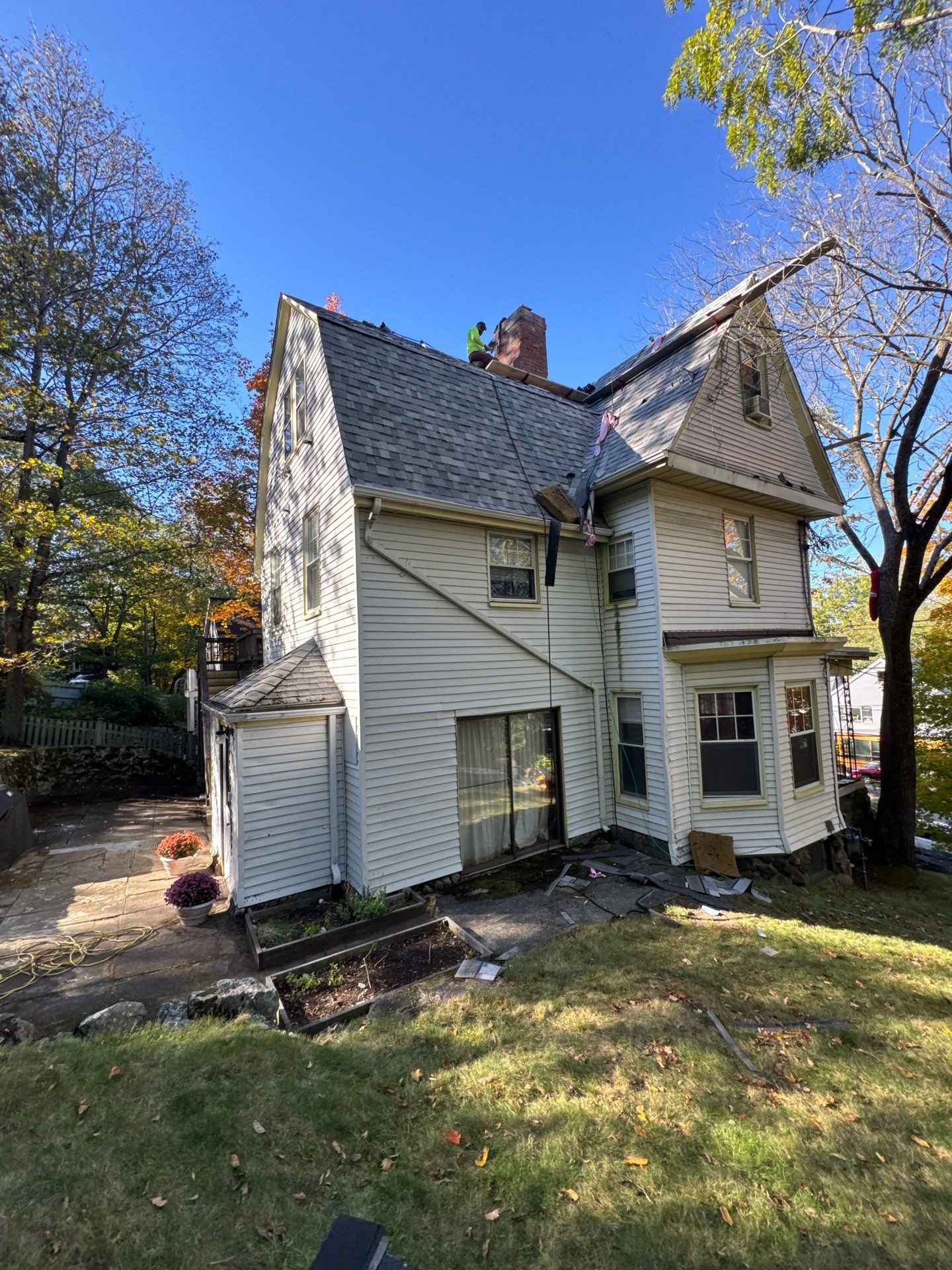 Full Roof & Porch EPDM Replacement with Skylight and Chimney Repairs by Mighty Dog Roofing of Greater Middlesex County