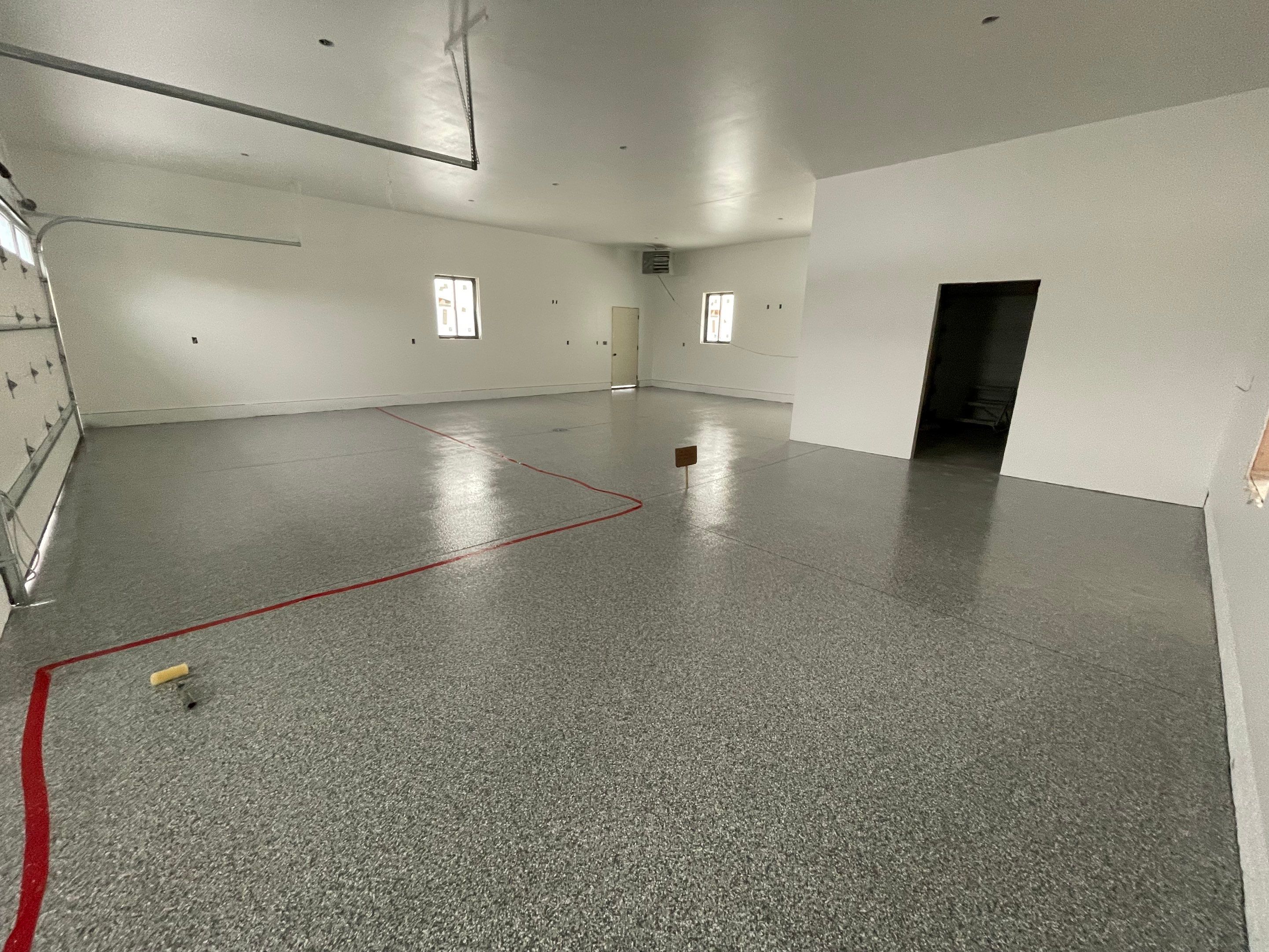 Garage using Slate Stone by Select Painting, Coatings & Garage Cabinets