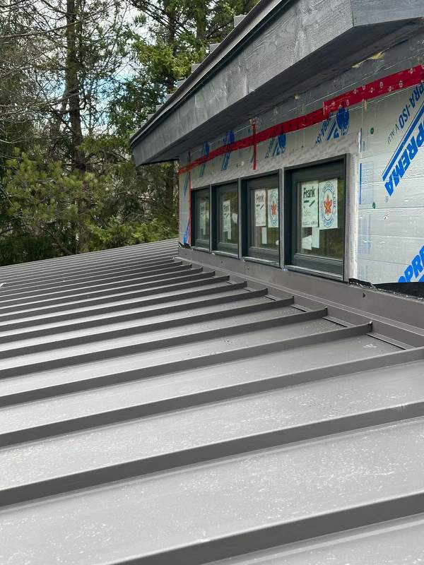 Residential Roofing Installation using 24 Ga Standing Seam Metal by Jay Carter Roofing & Sheet Metal