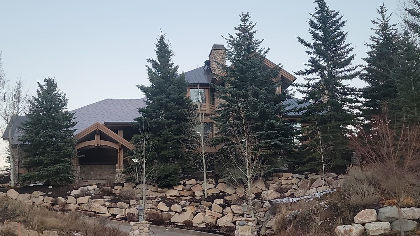 Standing Seam Metal Roof Replacement After Snow Damage by ASAP Roofing & Restoration