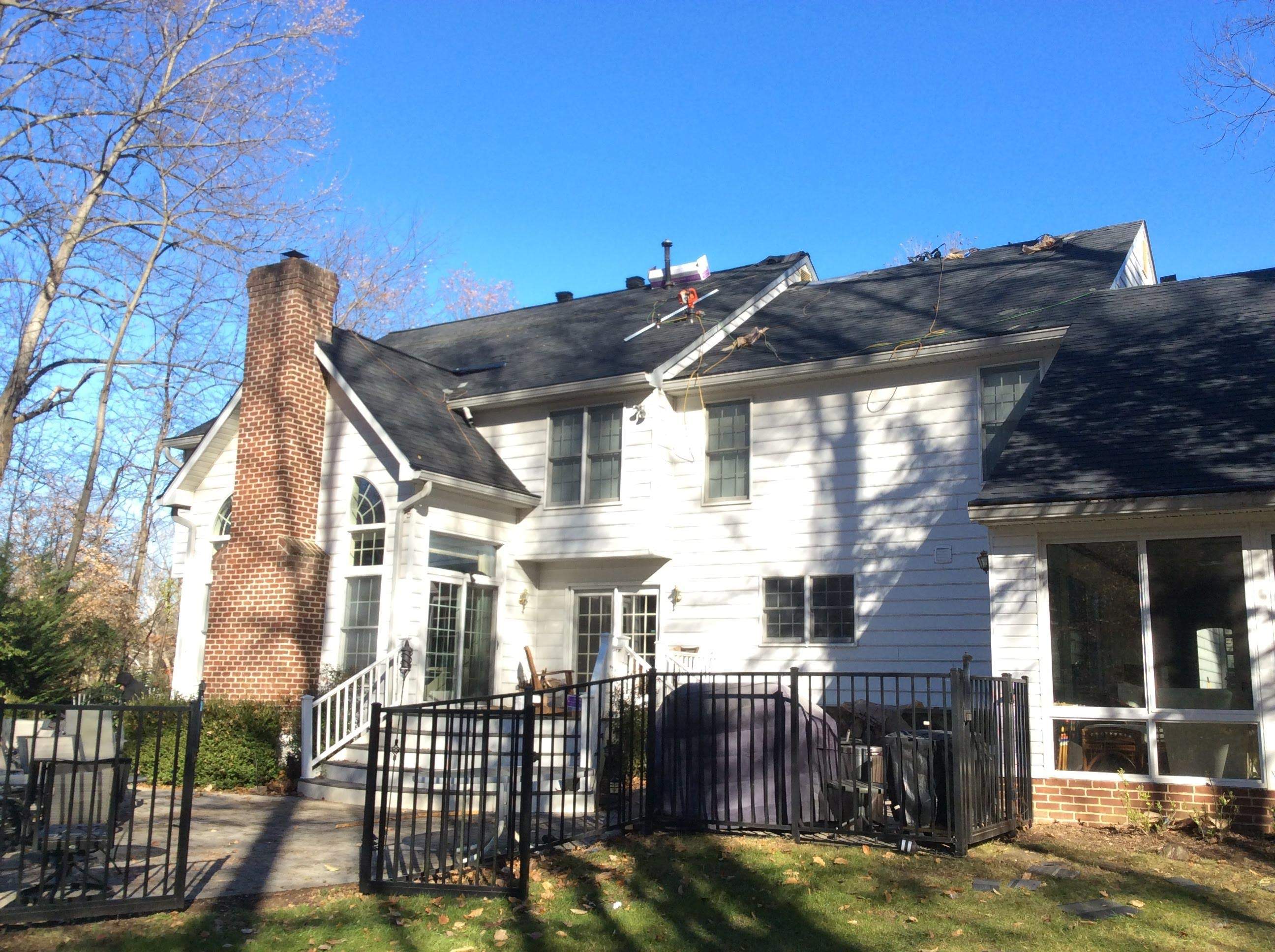 Residential Roofing Installation using Charcoal Black by Alpha Design Services