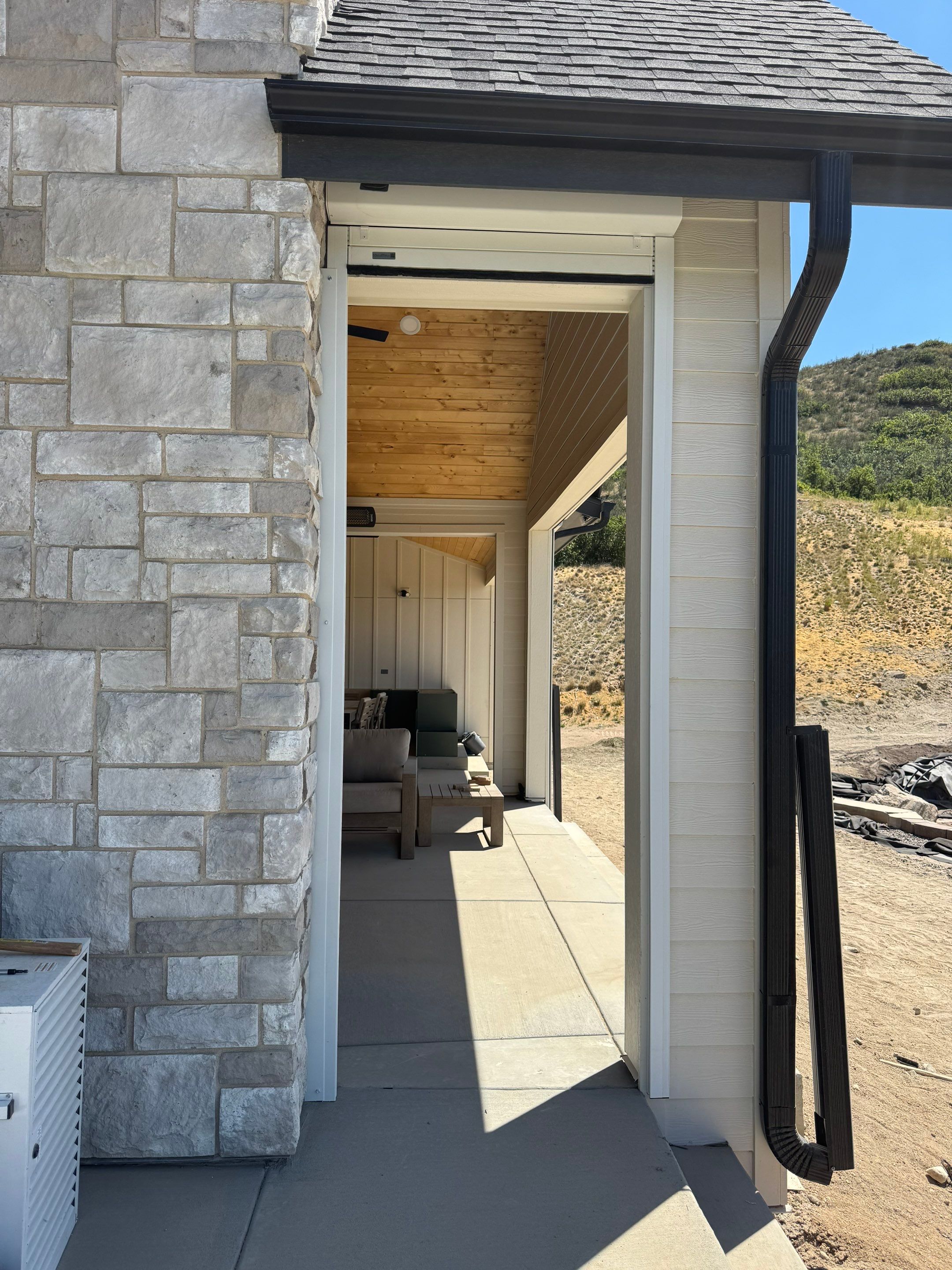Custom Exterior MagnaTrack Screens for Modern Farmhouse Patio in Castle Rock by Outdoor Solutions Colorado