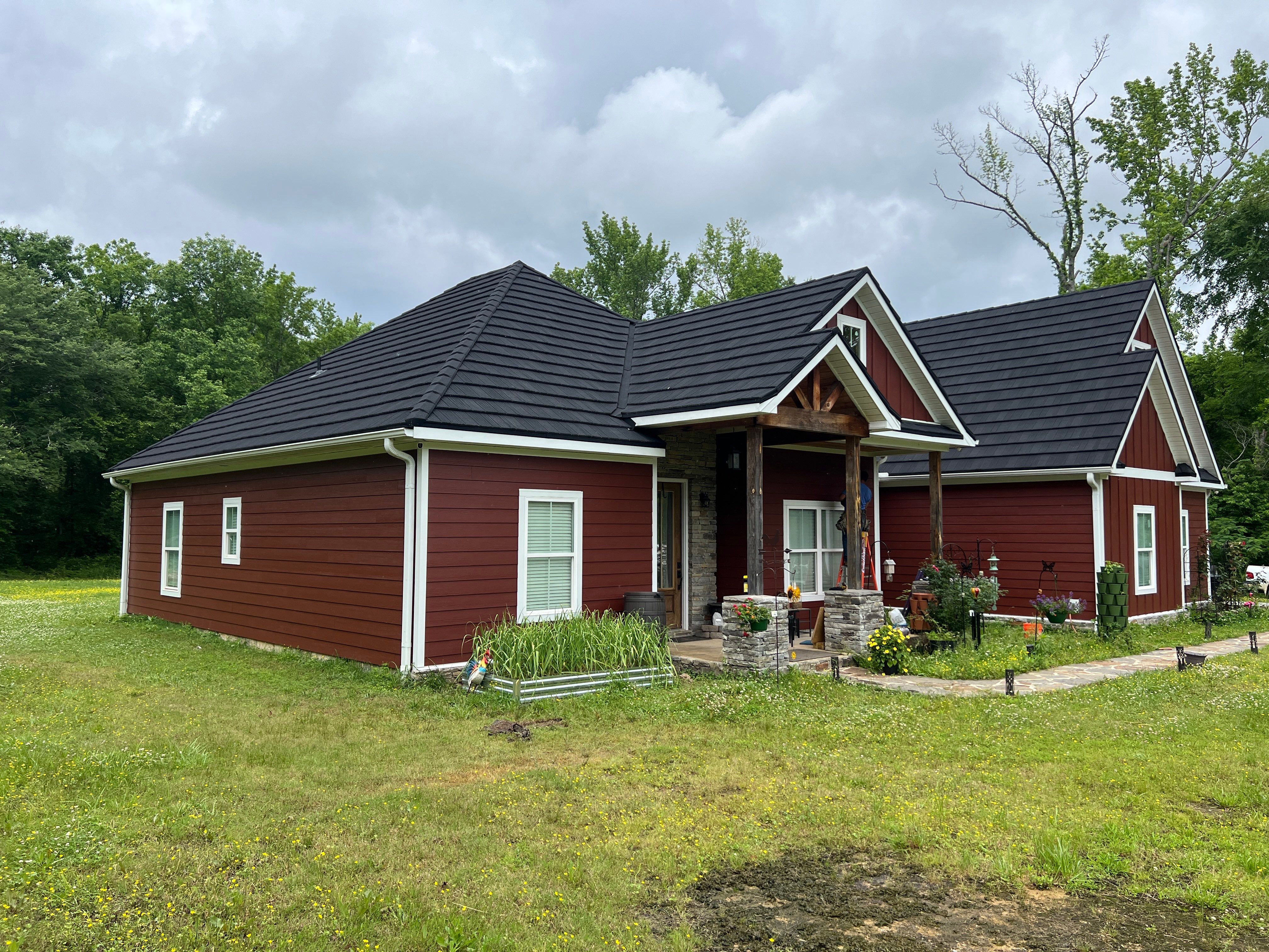 Siding Replacement using James Hardie Countrylane Red by Freedom Exteriors