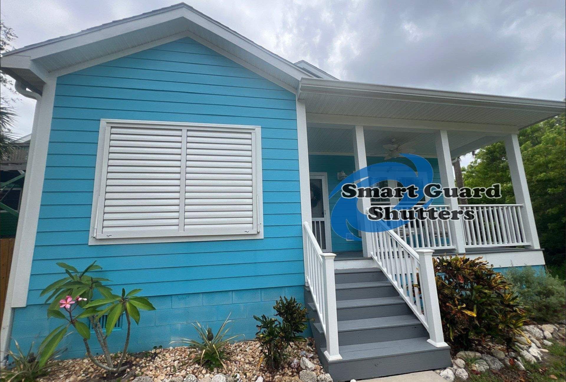 Impact Bahama Shutter in Signal White by Smart Guard Shutters