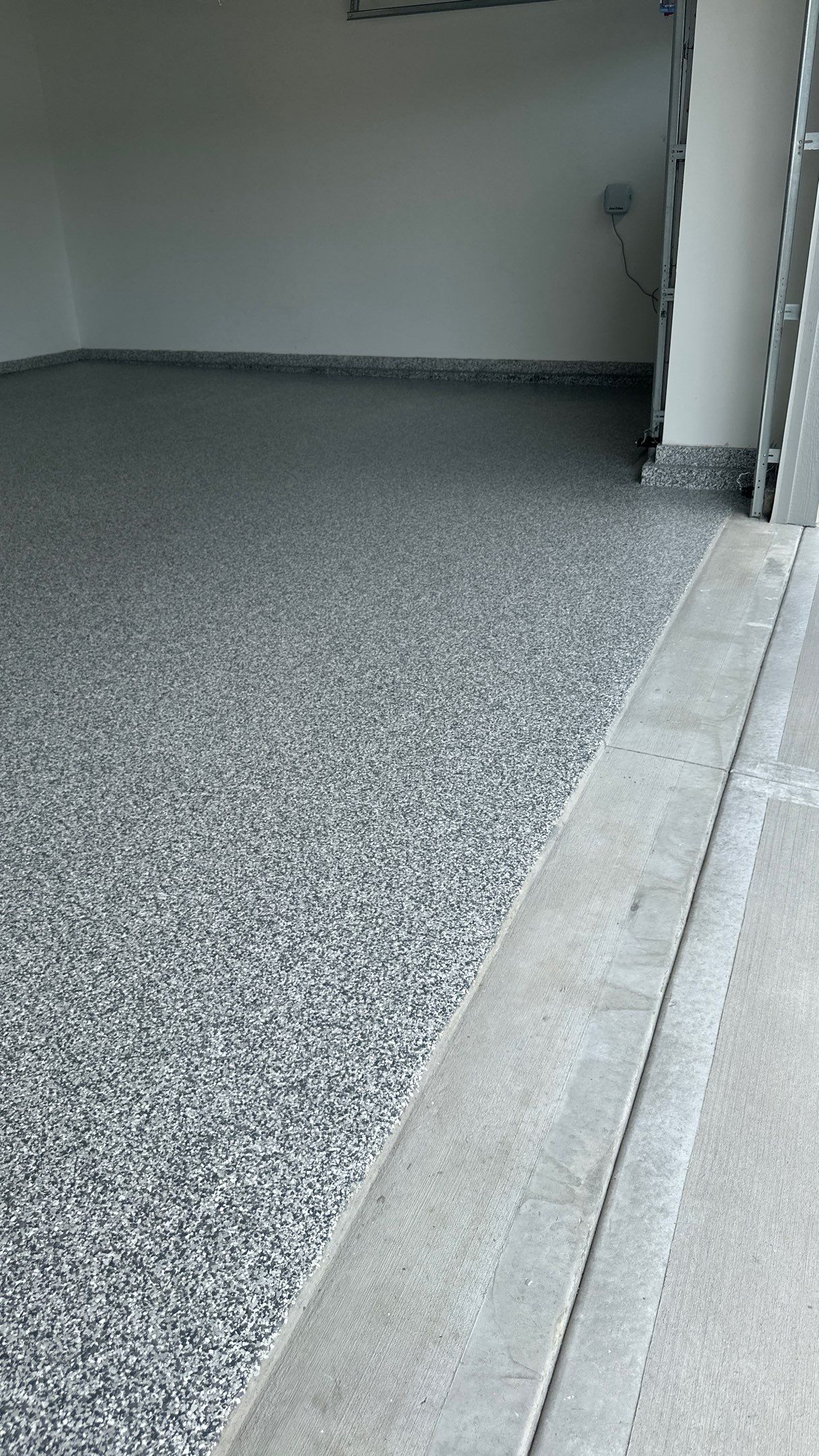 Stonhenge flake floors just look great. Wow!!! by Banner Garage