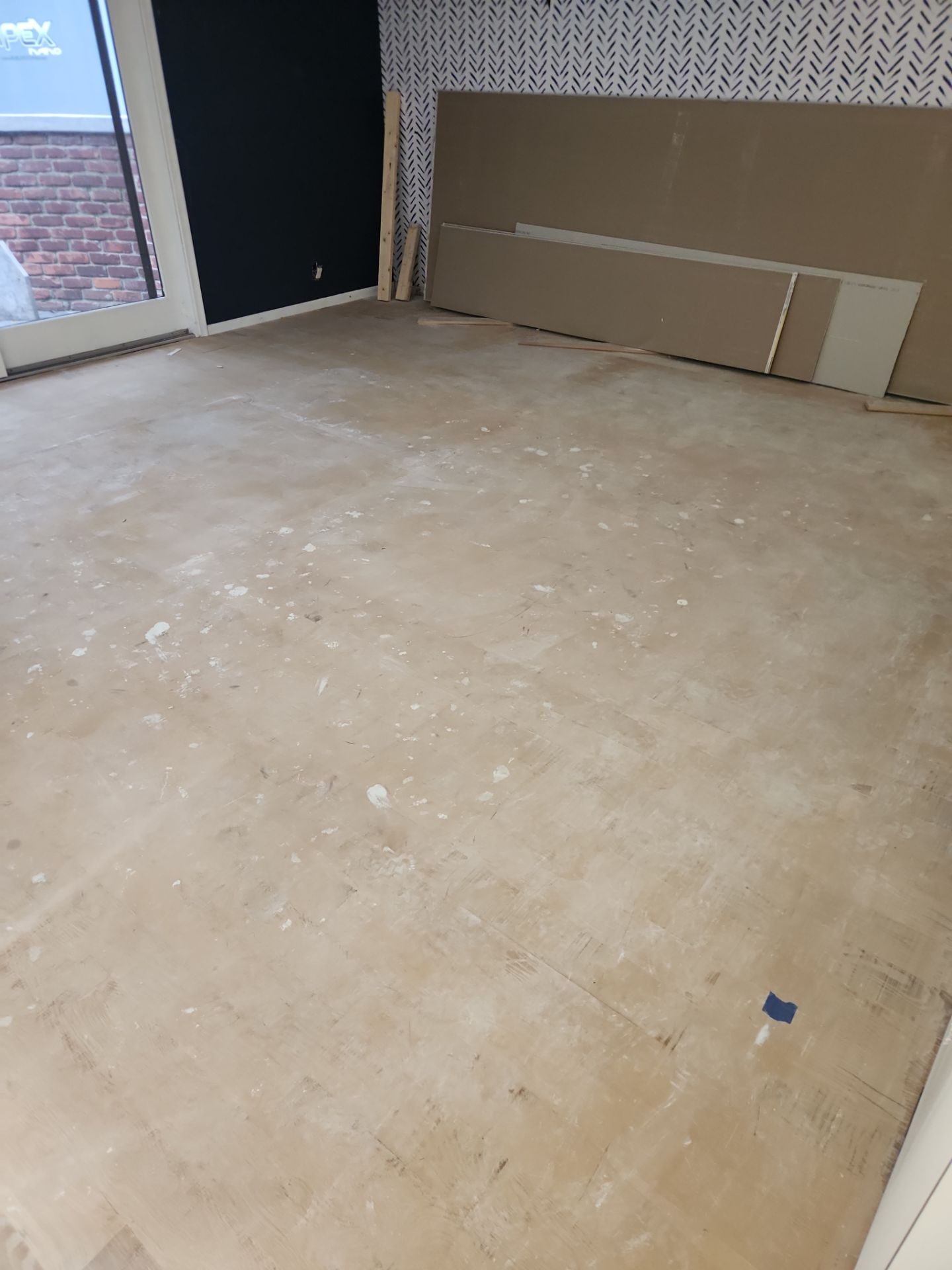 New Flooring installation using 4" White oak select grade plain sawn Ebony Stain by Ann Arbor Hardwoods