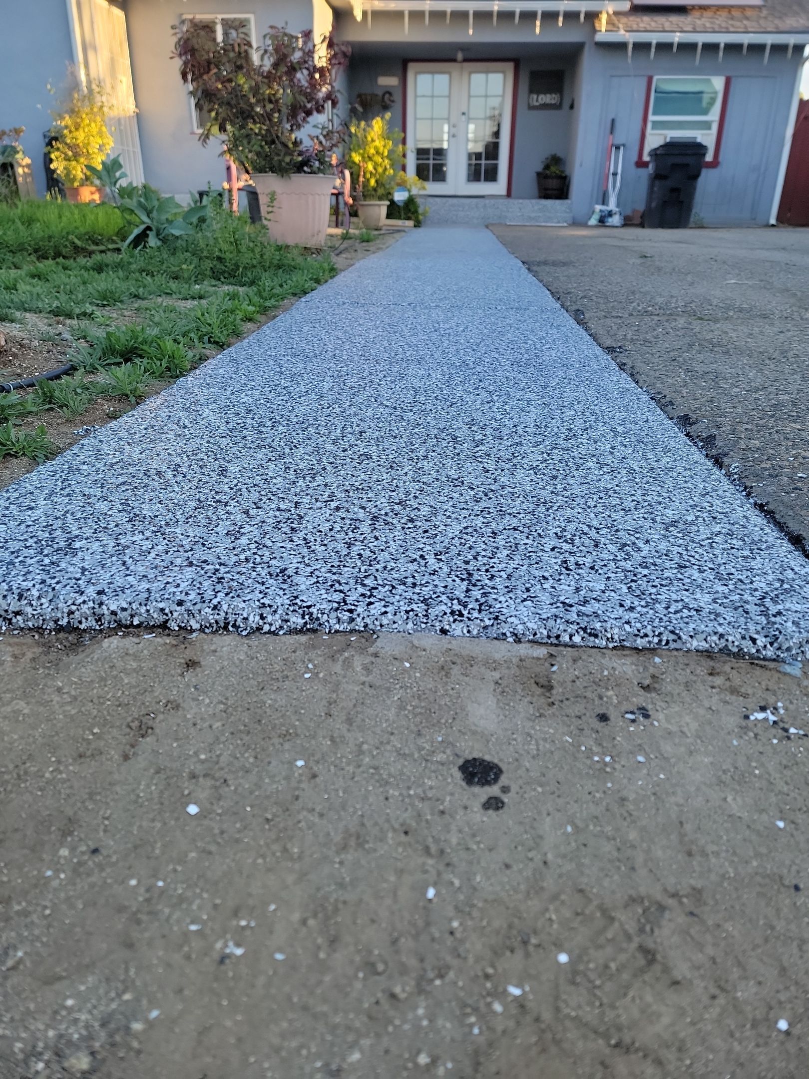 Front Porch and walkway by MGP Coatings